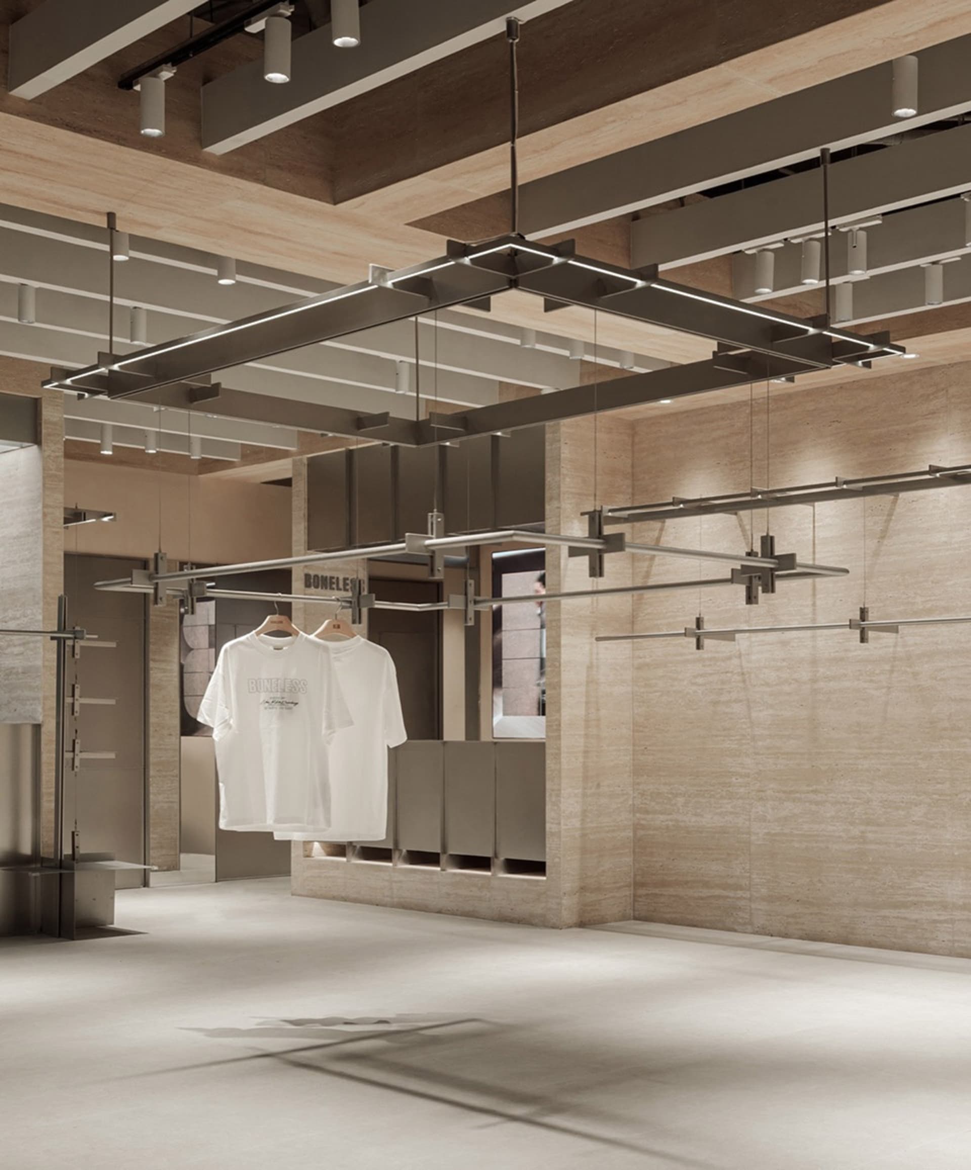 Modern retail interior with concrete walls and minimalistic design.
