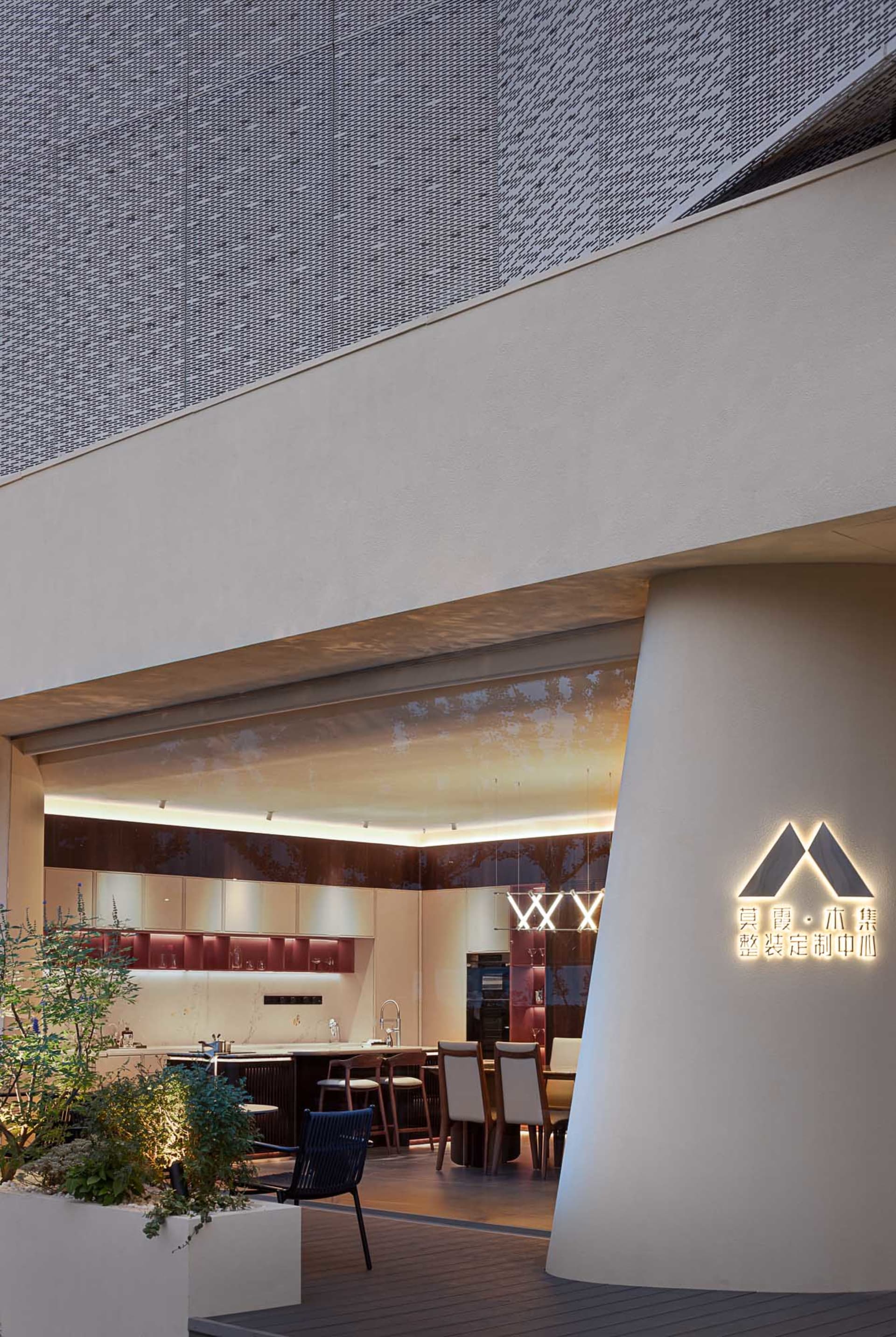 Modern urban retail space with metal and glass materials.