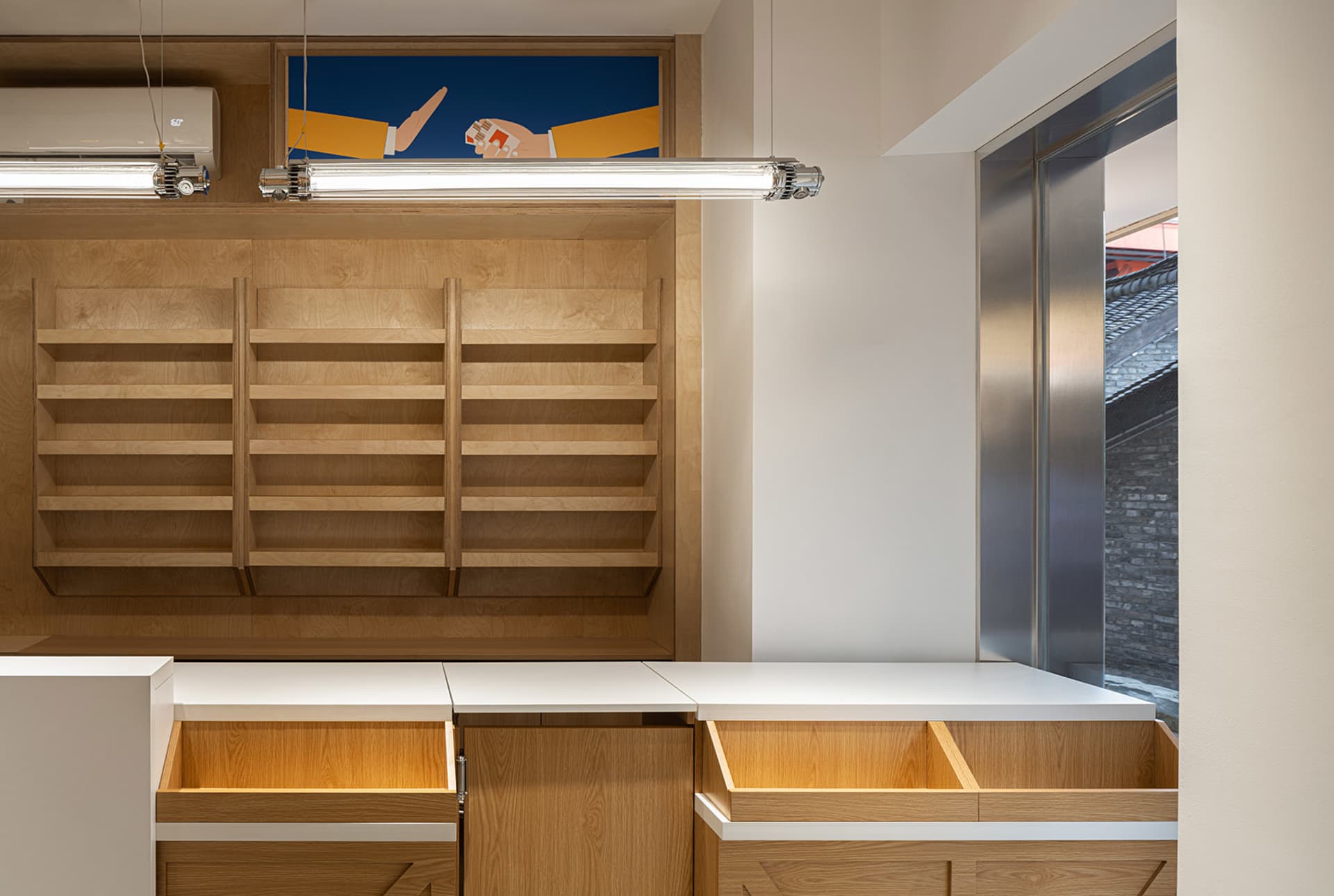 A modern commercial space featuring wooden furniture, showcasing sleek, minimalist design with natural wood textures.