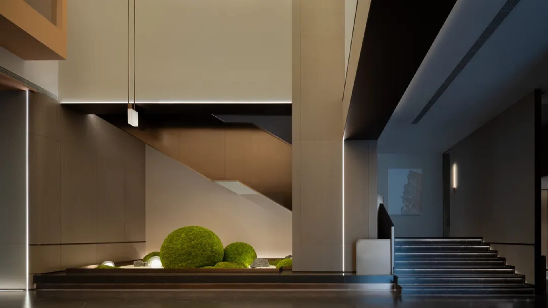 A modern lobby with concrete walls and minimalist decor.
