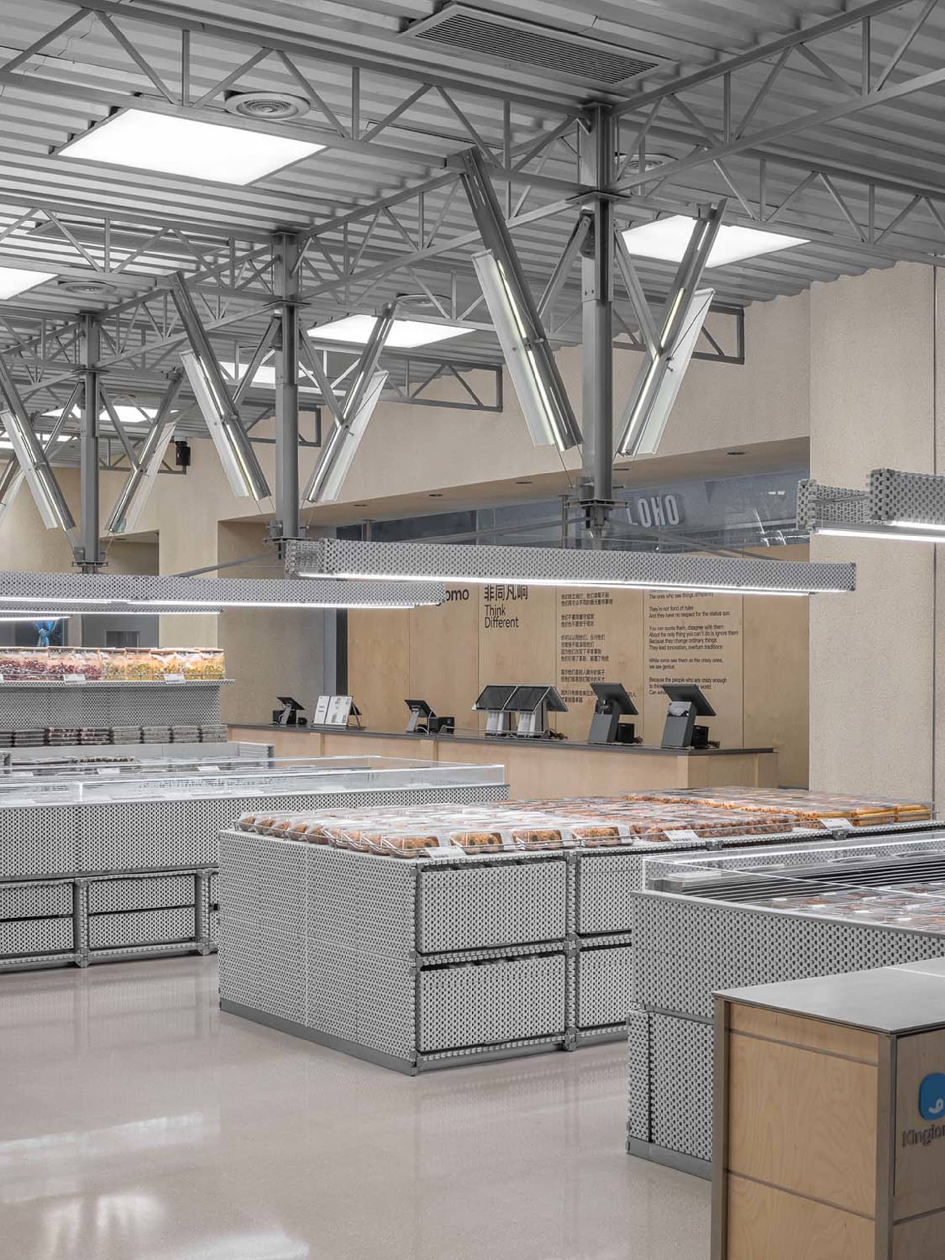 Metallic retail food court with sleek, industrial design.