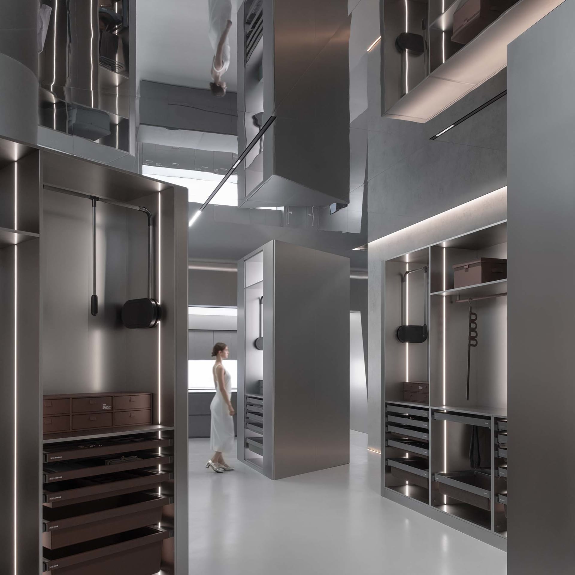 Photograph of a modern, minimalist wardrobe interior with glass, metallic, and wooden materials, featuring sleek, open shelve