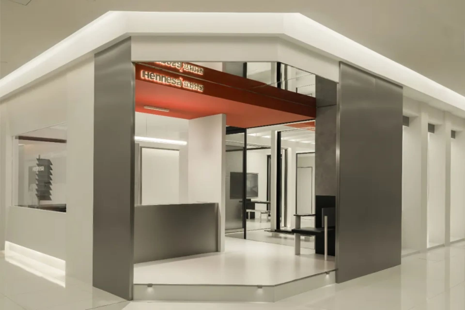 Modern retail storefront with glass windows and signage
