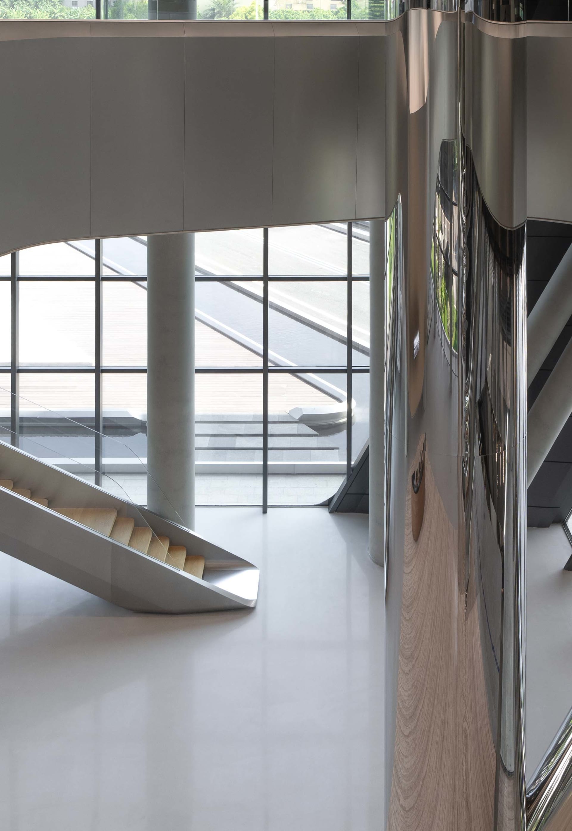 Stairs made of glass material in a modern setting.