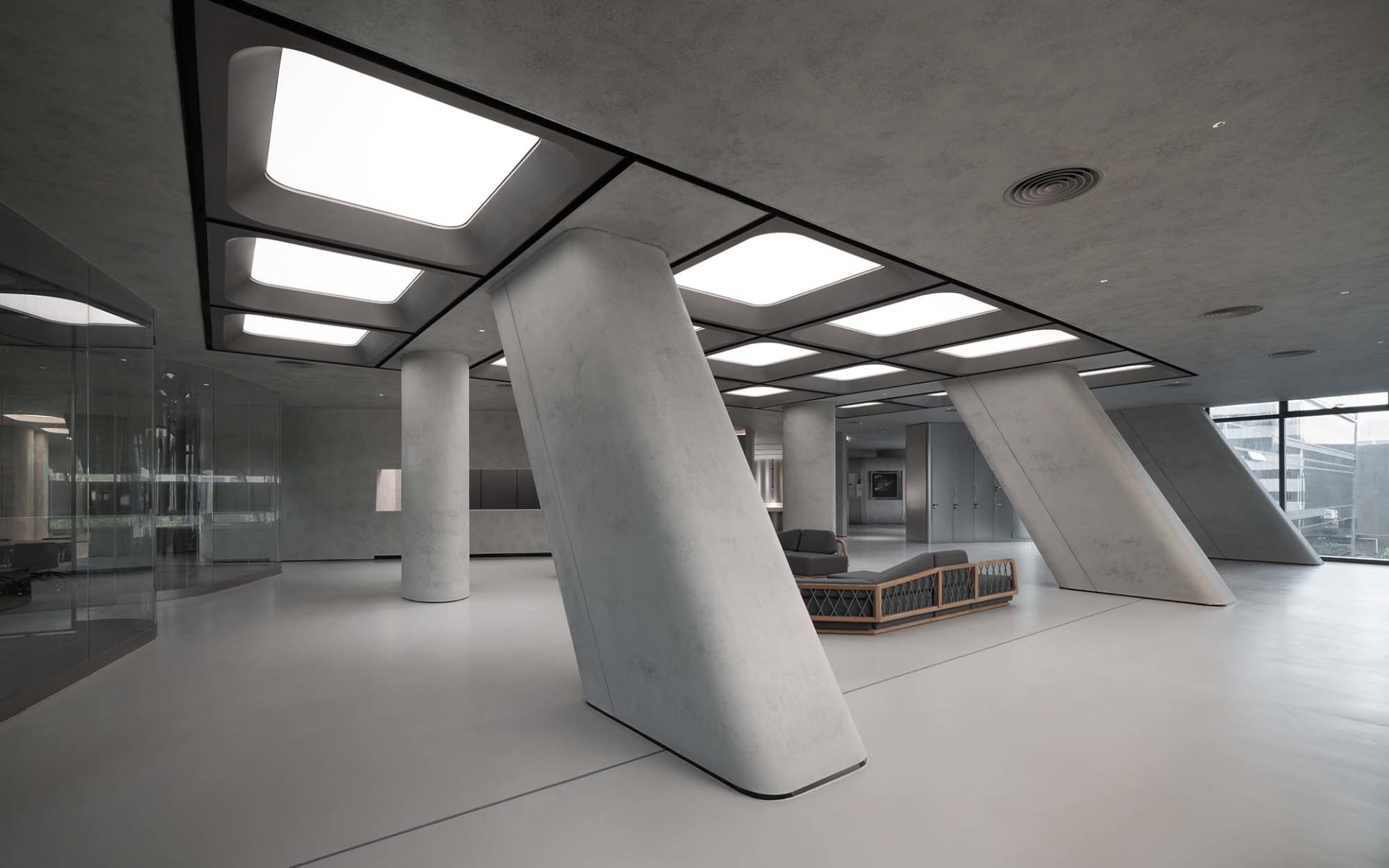 Modern office interior with concrete columns and white flooring.