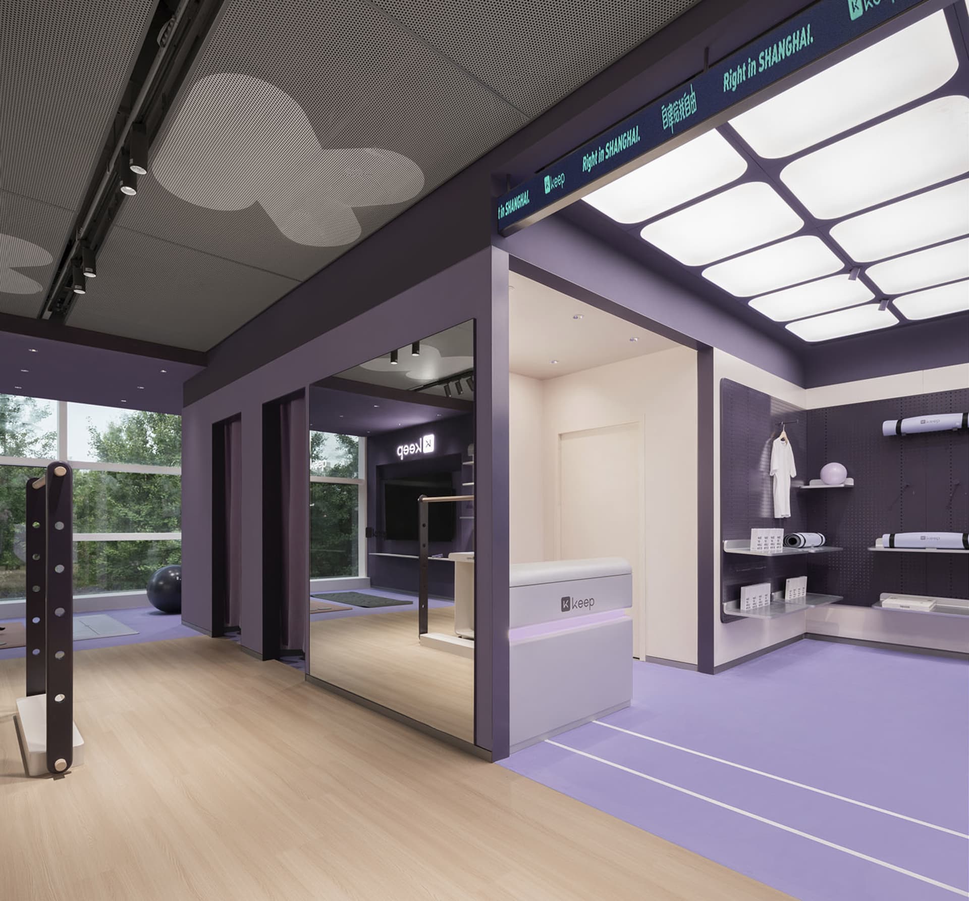A modern purple fitness center with white paneling and hardwood floors.