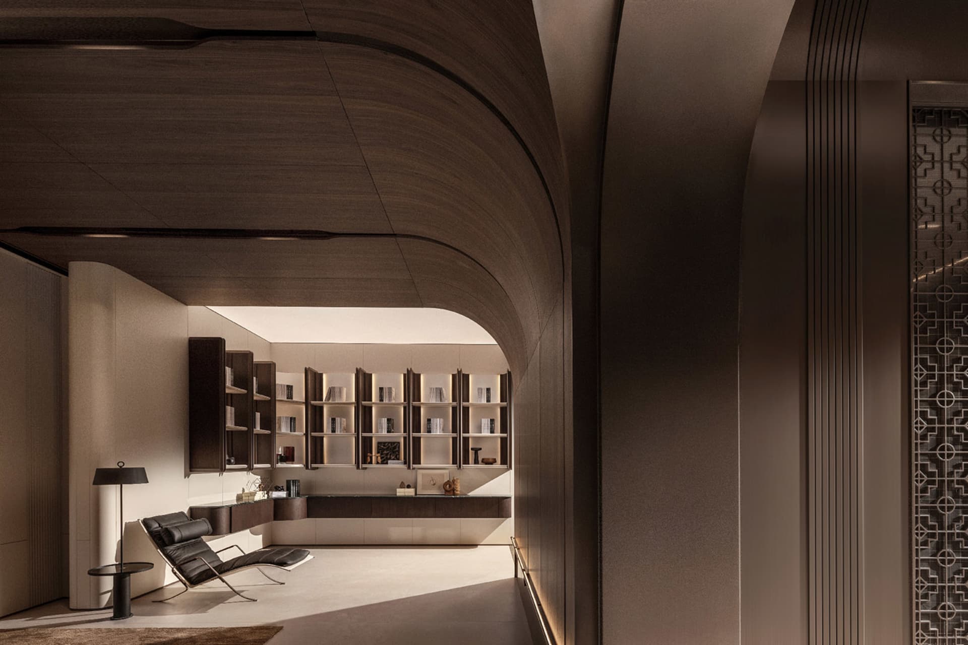 A minimalist interior design featuring a modern bookshelf nook with a comfortable lounge chair and a sleek floor lamp.