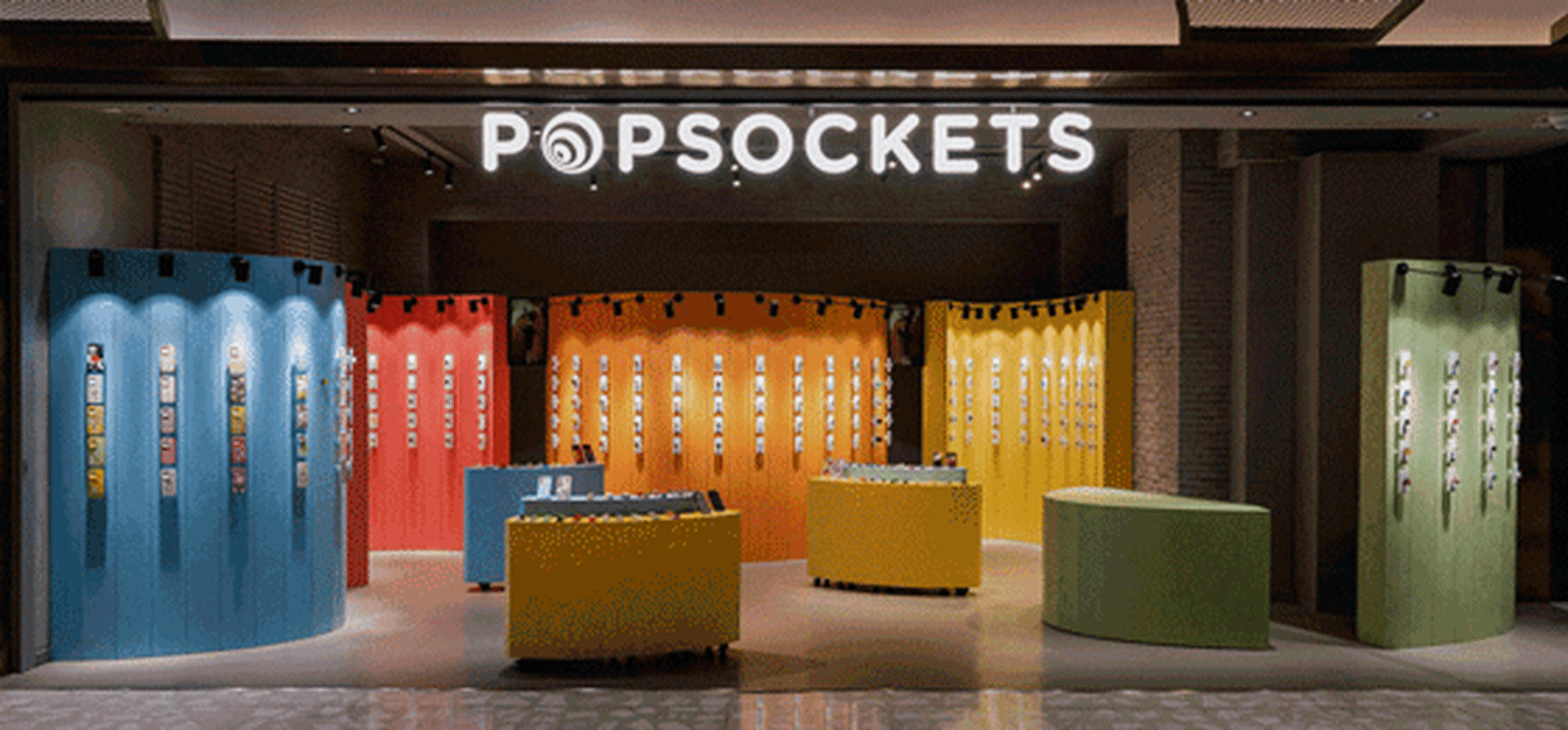 PopSockets product display with colorful products and hanging racks