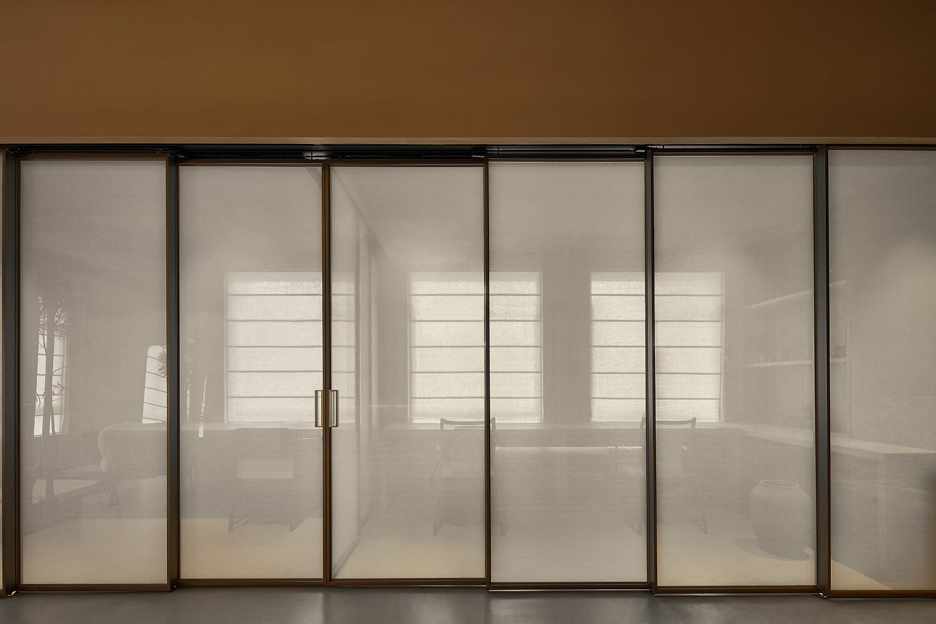 Modern living room with glass wall