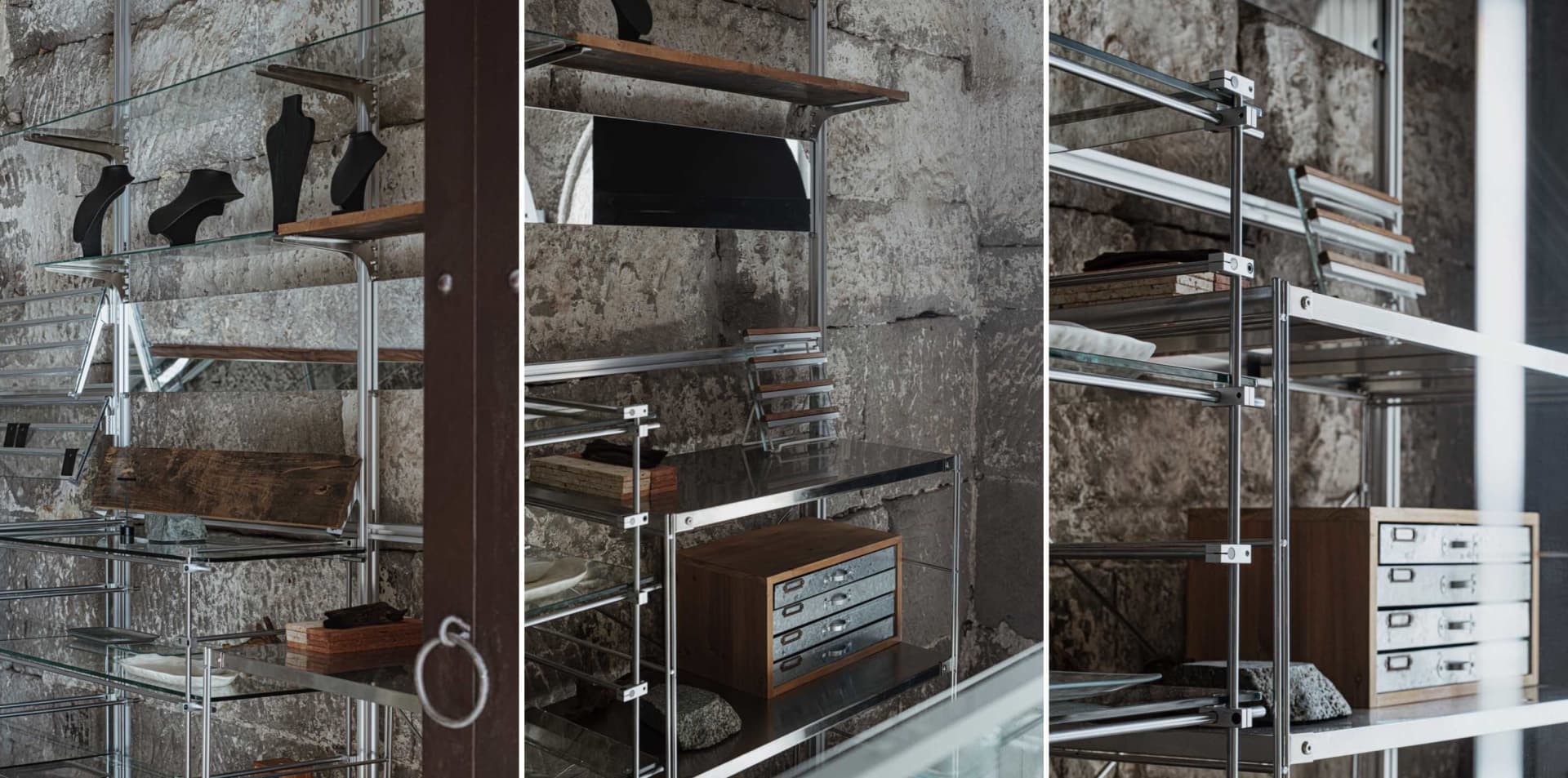 A modern storage shelf with glass and metal components.