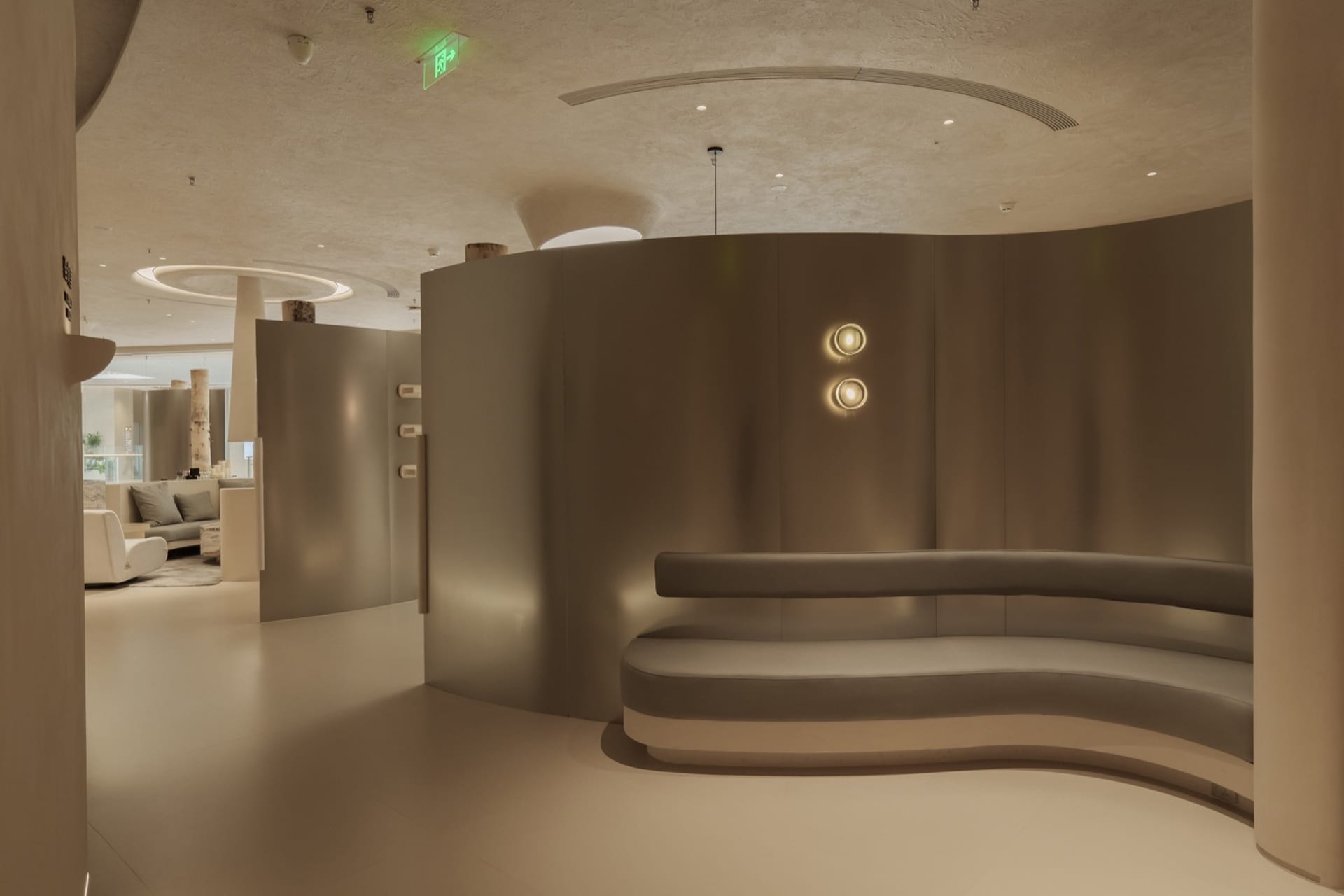 Modern retail space featuring metallic acoustic-paneled walls