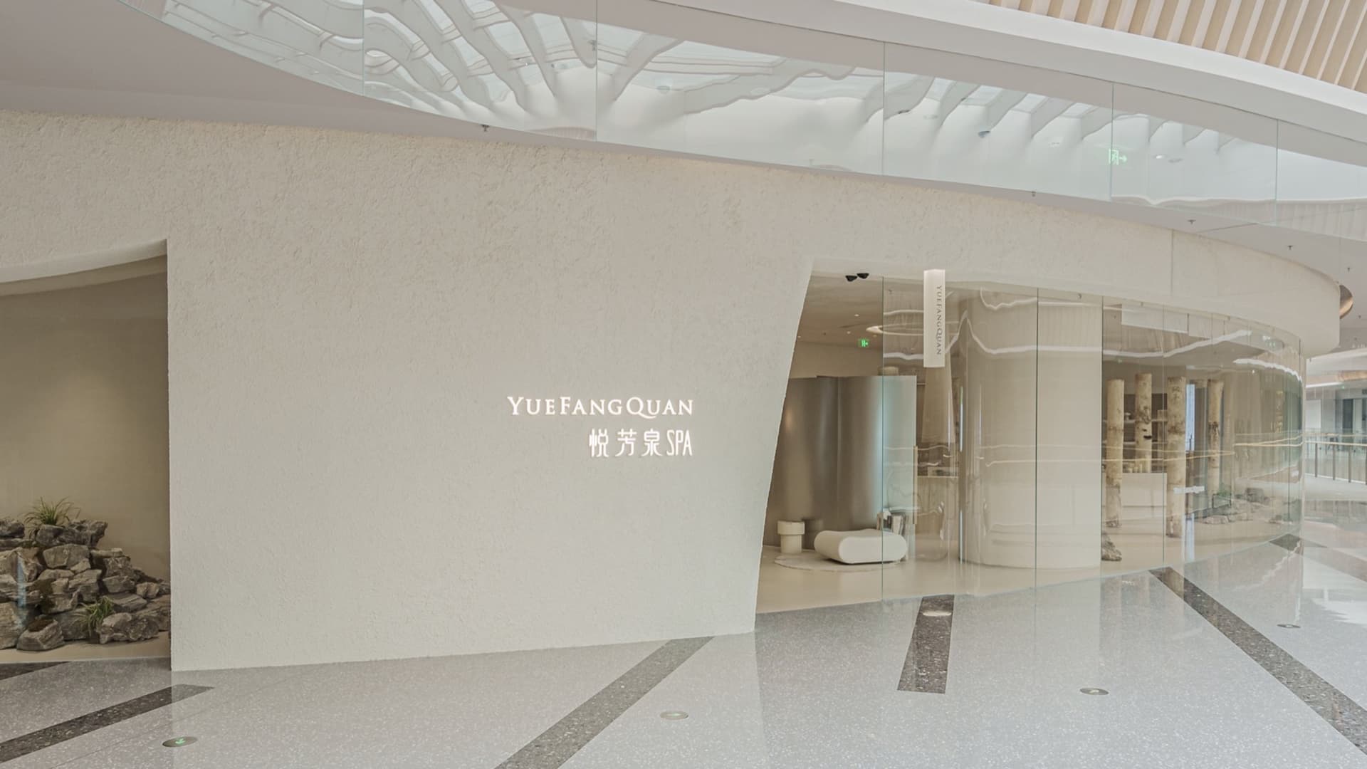 Modern spa interior with glass features for relaxation and tranquility.