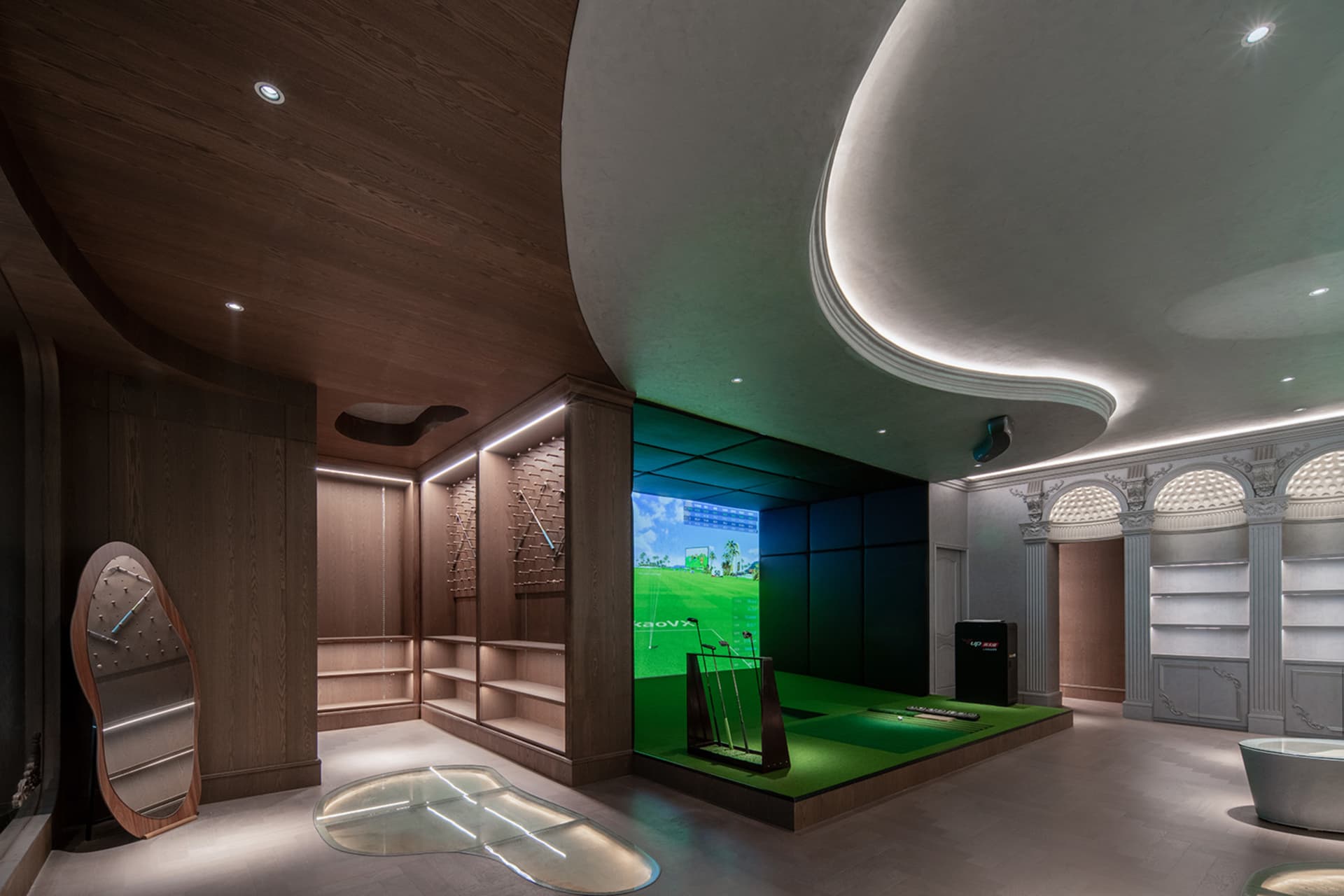 An elegant indoor golf driving range featuring modern design elements.
