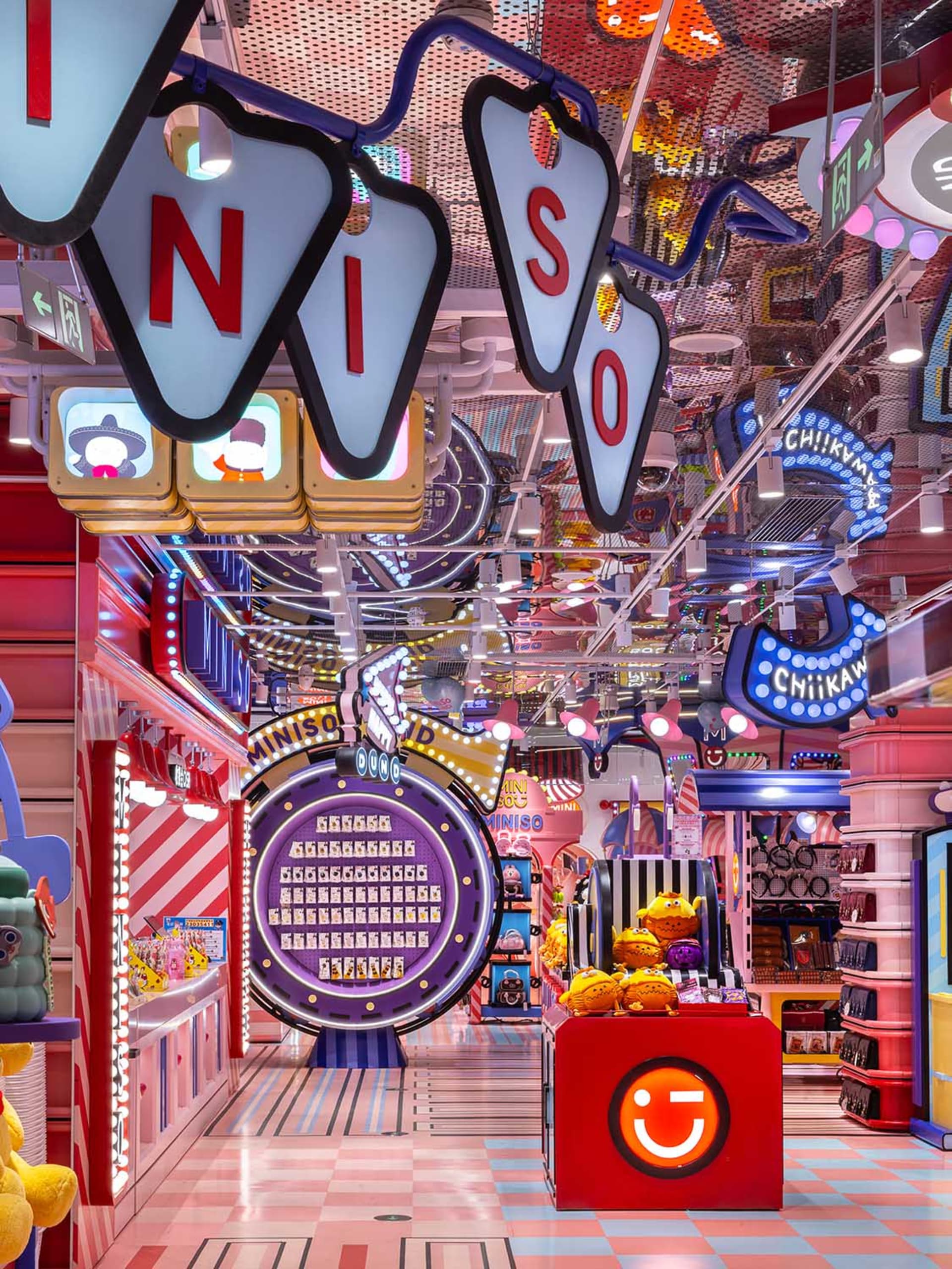 Colorful Miniso store with bright lights and various products on display.