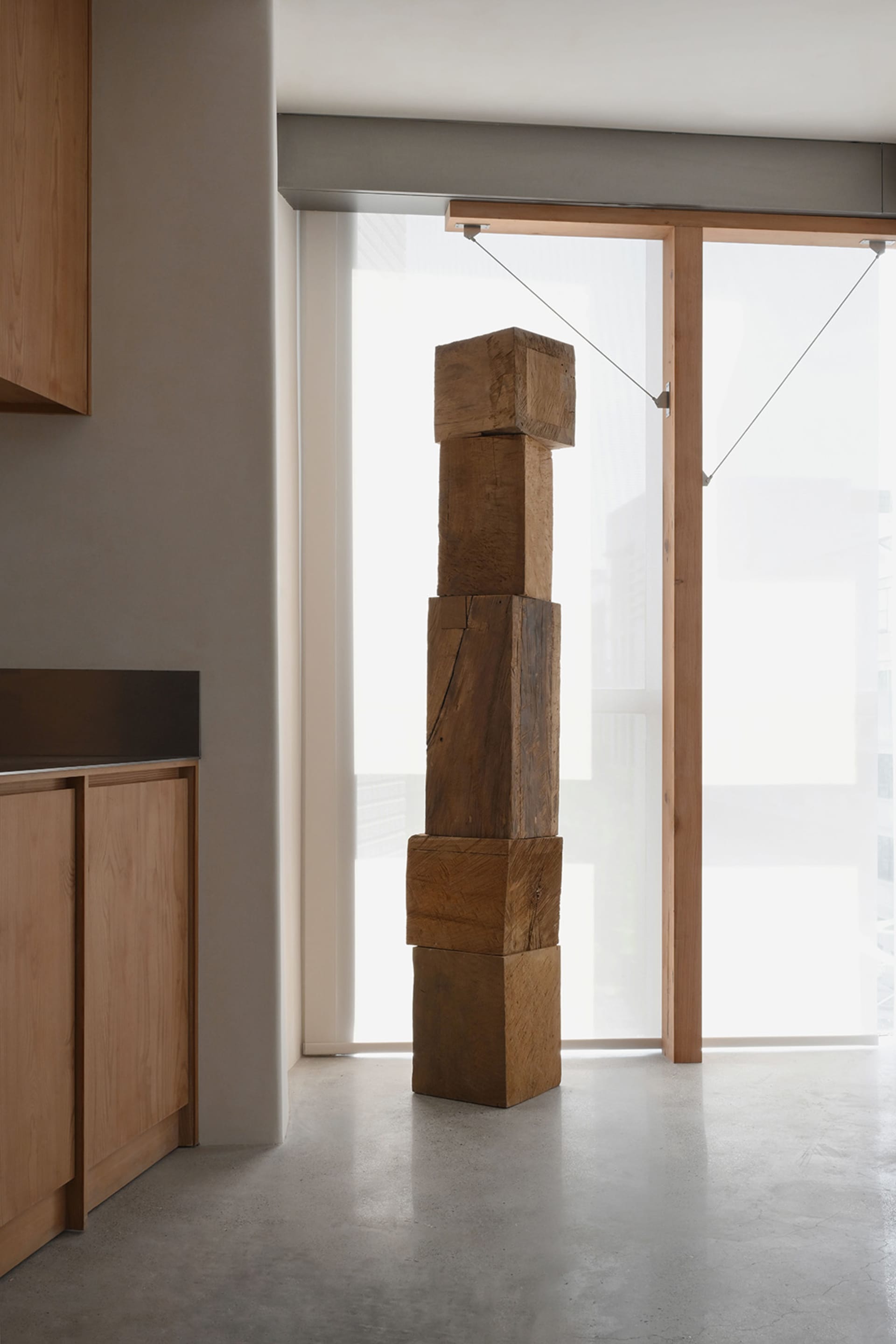 Modern interior space featuring a wooden column
