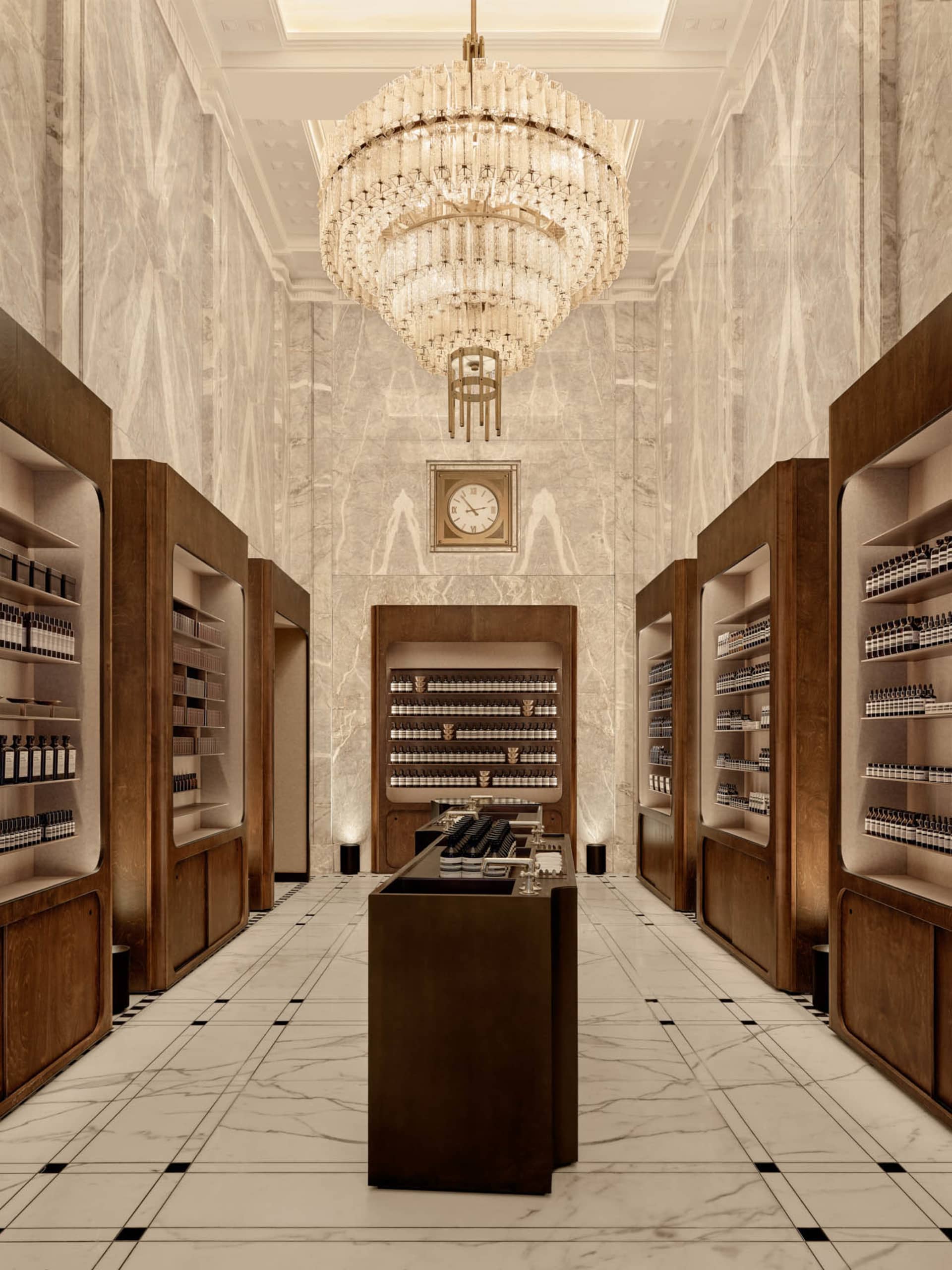 Luxurious retail store with marble walls and wood shelves