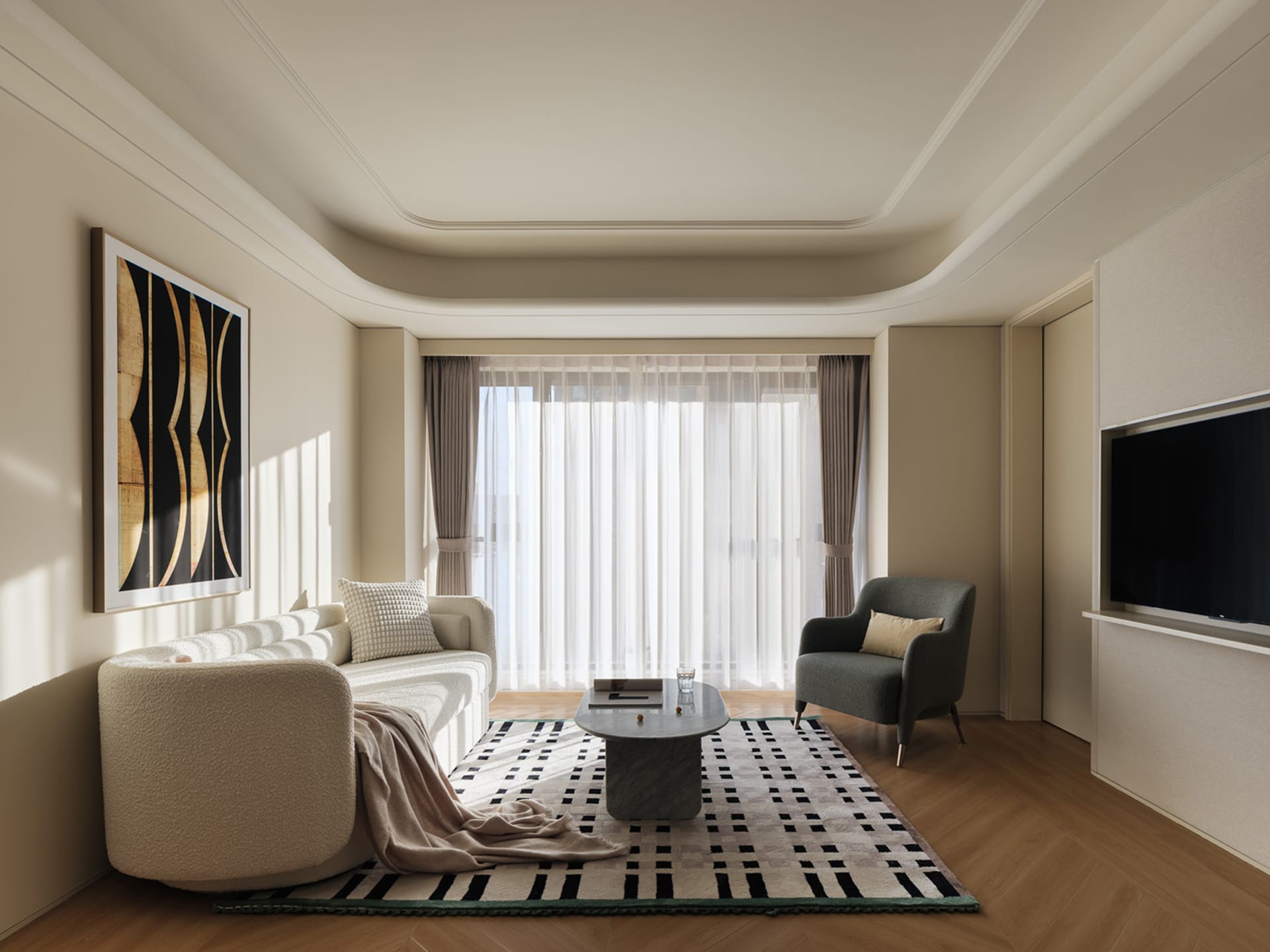 A modern living room featuring a cozy white sofa, a sleek marble coffee table, and a contemporary art piece on the wall, all