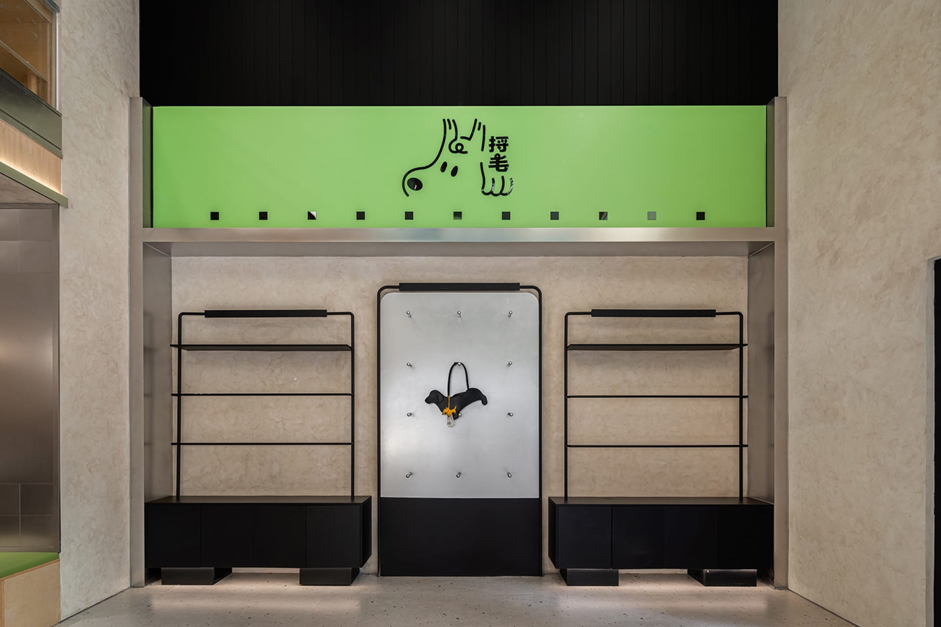 A modern retail storefront with black and glass elements