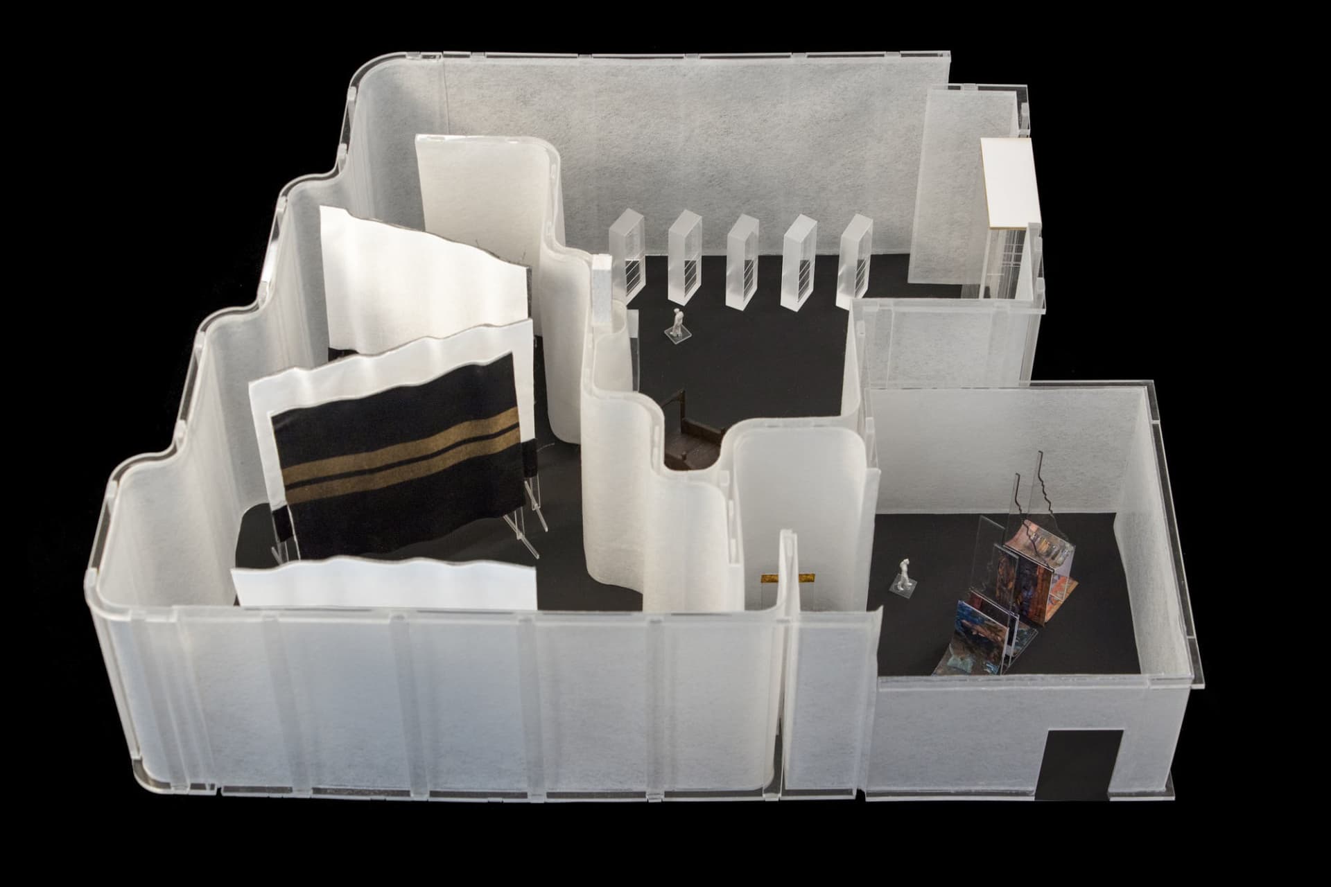 Clear plastic dividers in a model of an exhibition space
