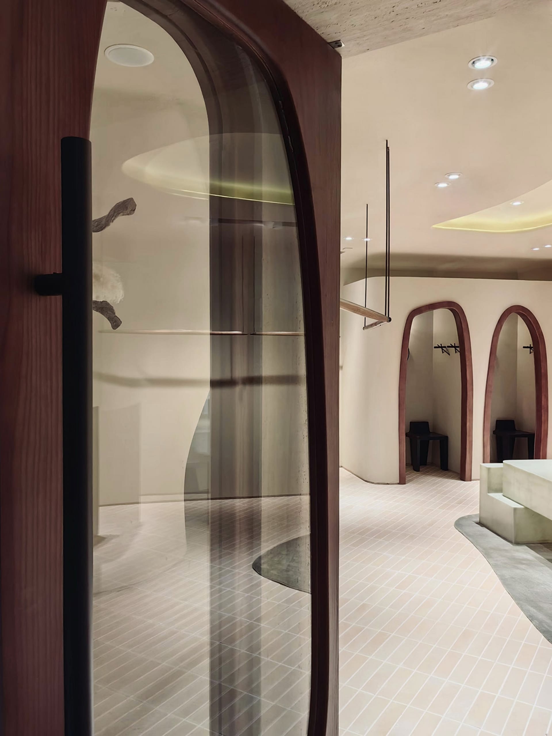 A minimalist retail storefront with wooden elements and an open, inviting design.