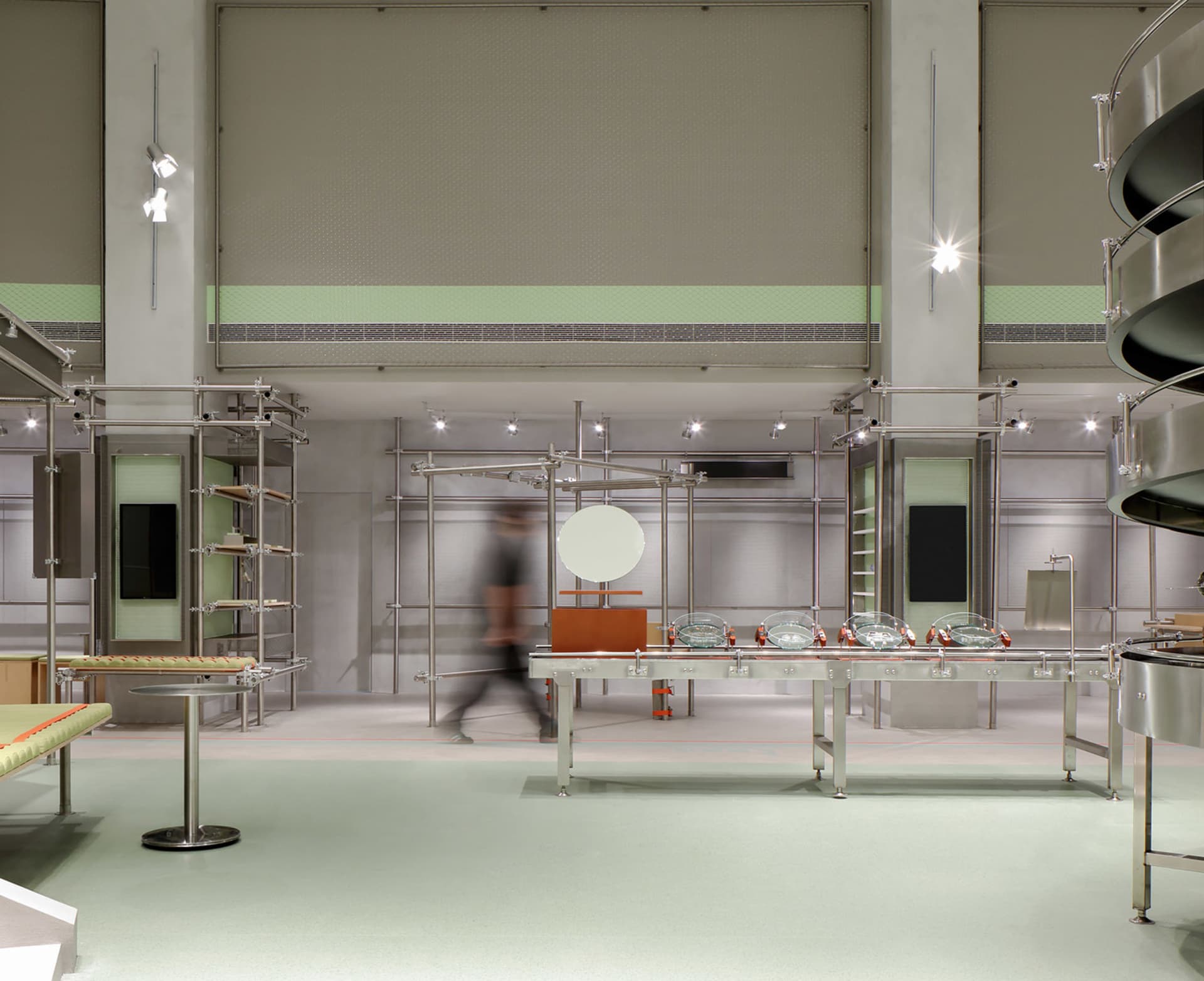 A modern retail space with metallic structural elements.