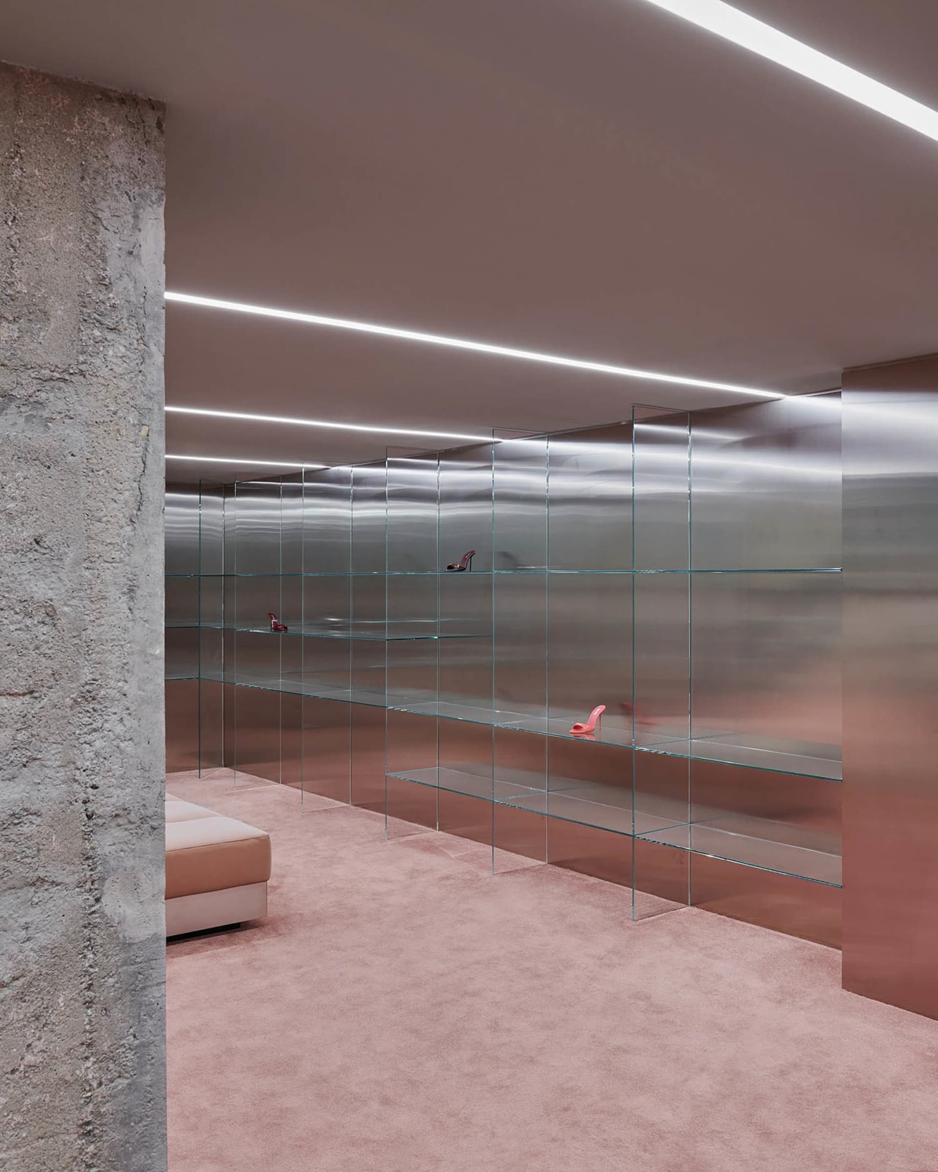 A sleek, modern display featuring empty glass shelves showcasing a minimalist interior design.