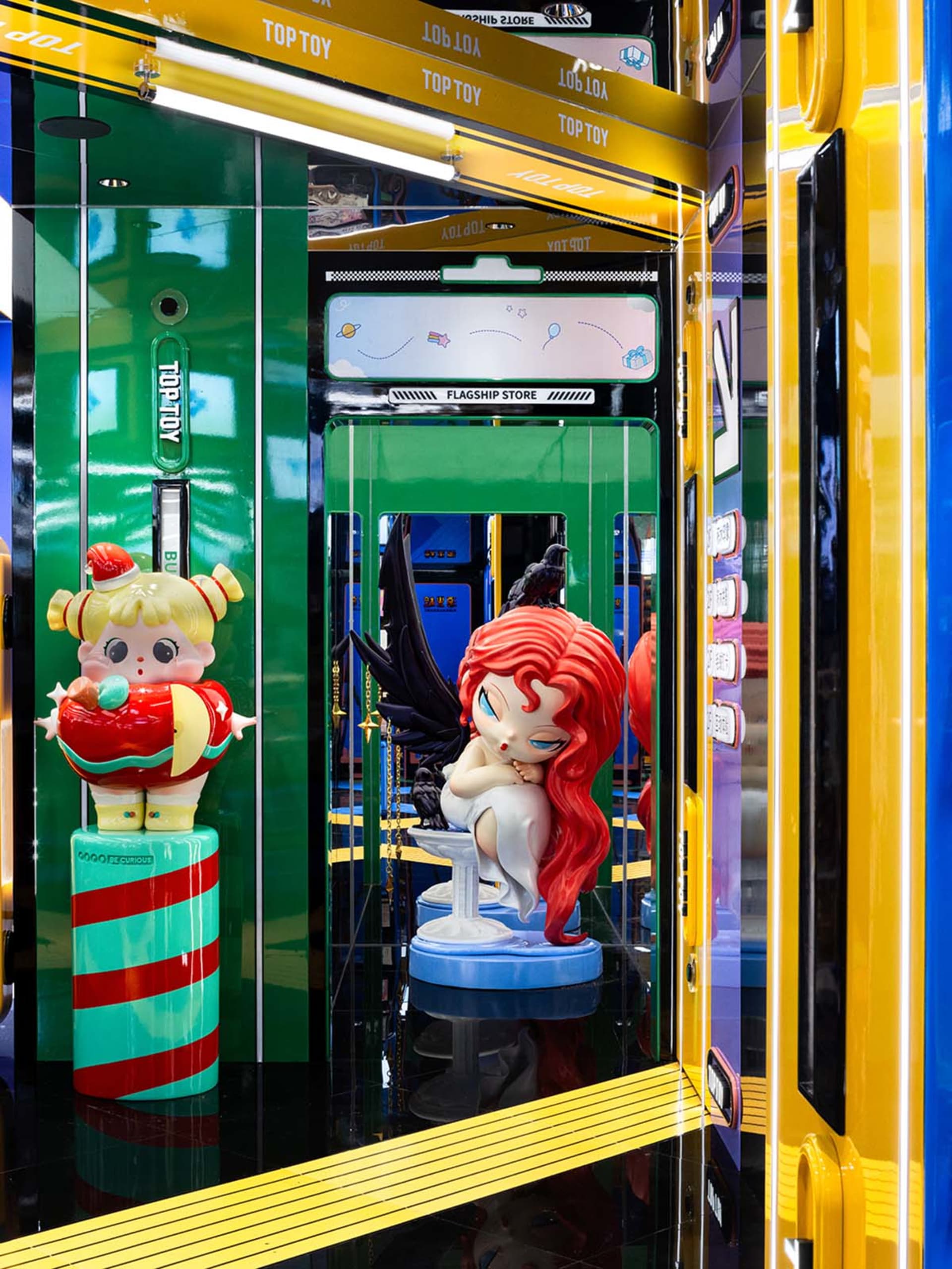 A colorful toy store display featuring plastic figurines and vibrant materials.