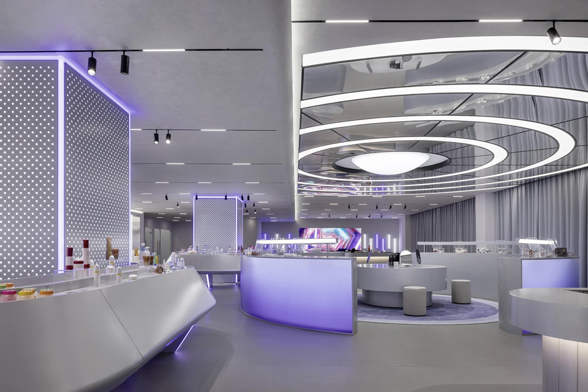 A modern restaurant interior featuring minimalist design with concrete and glass materials.