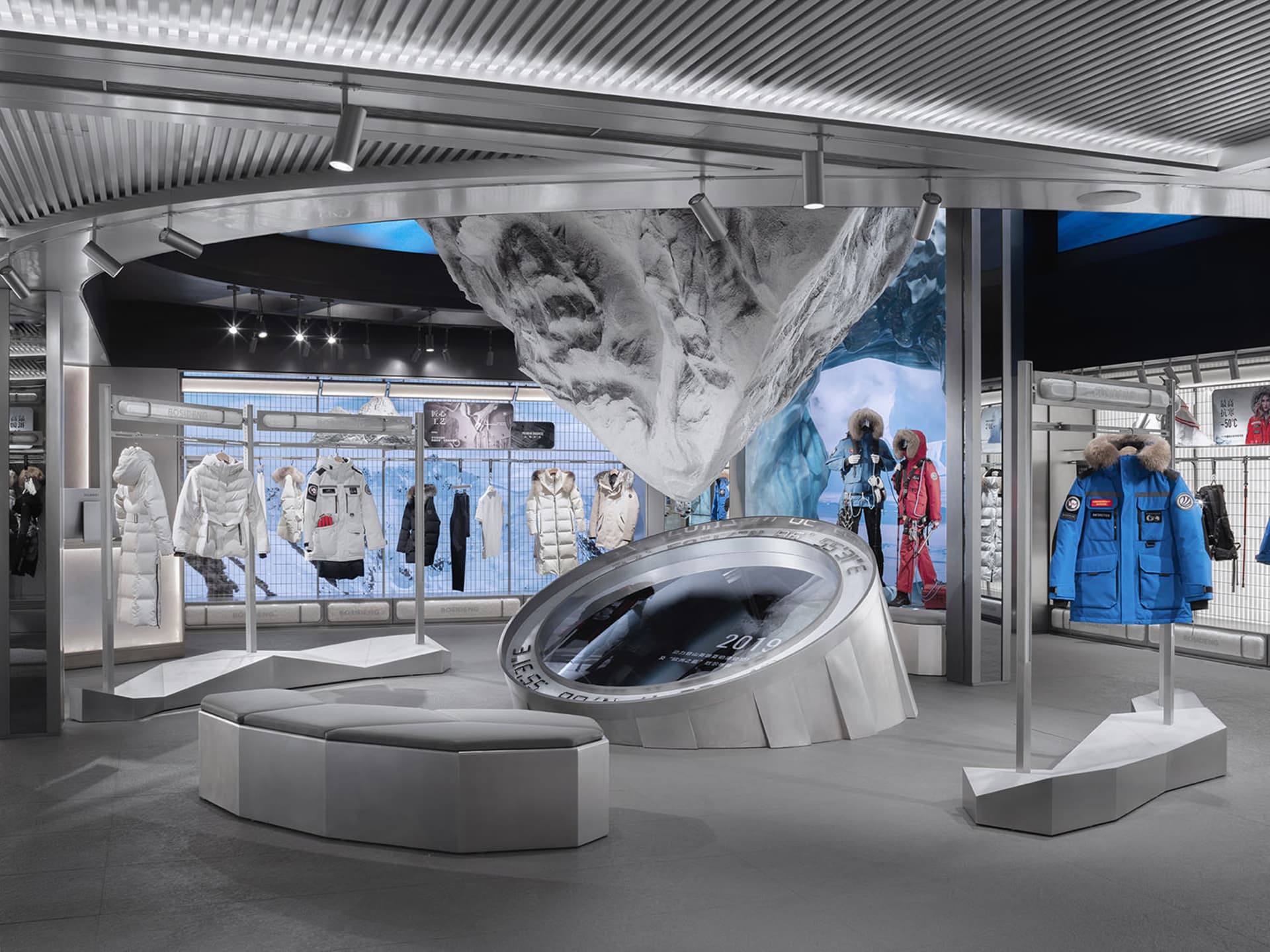 A retail shop featuring a modern interior design with metallic, glass, and ice elements.