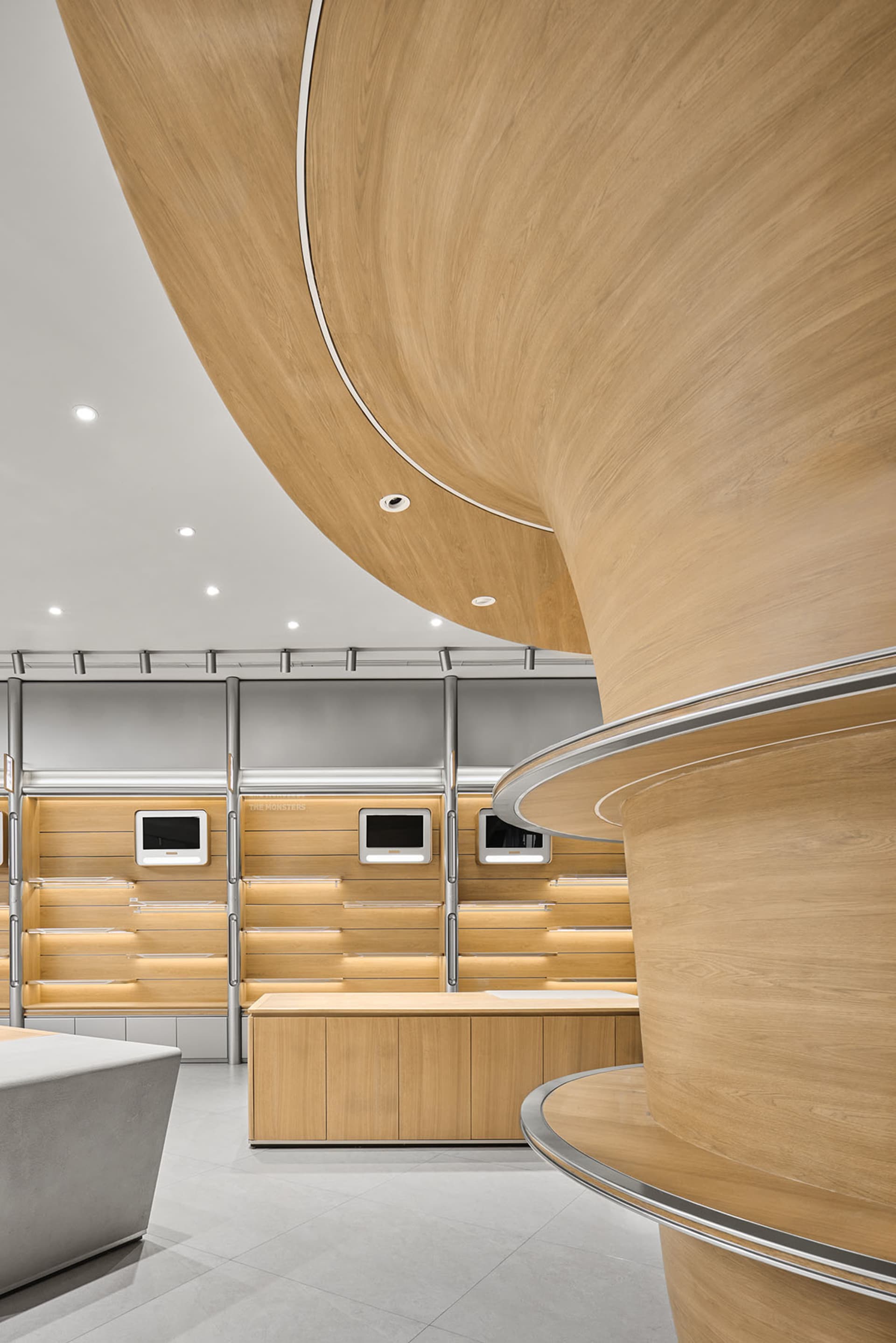 A modern retail space featuring wooden elements and sleek design