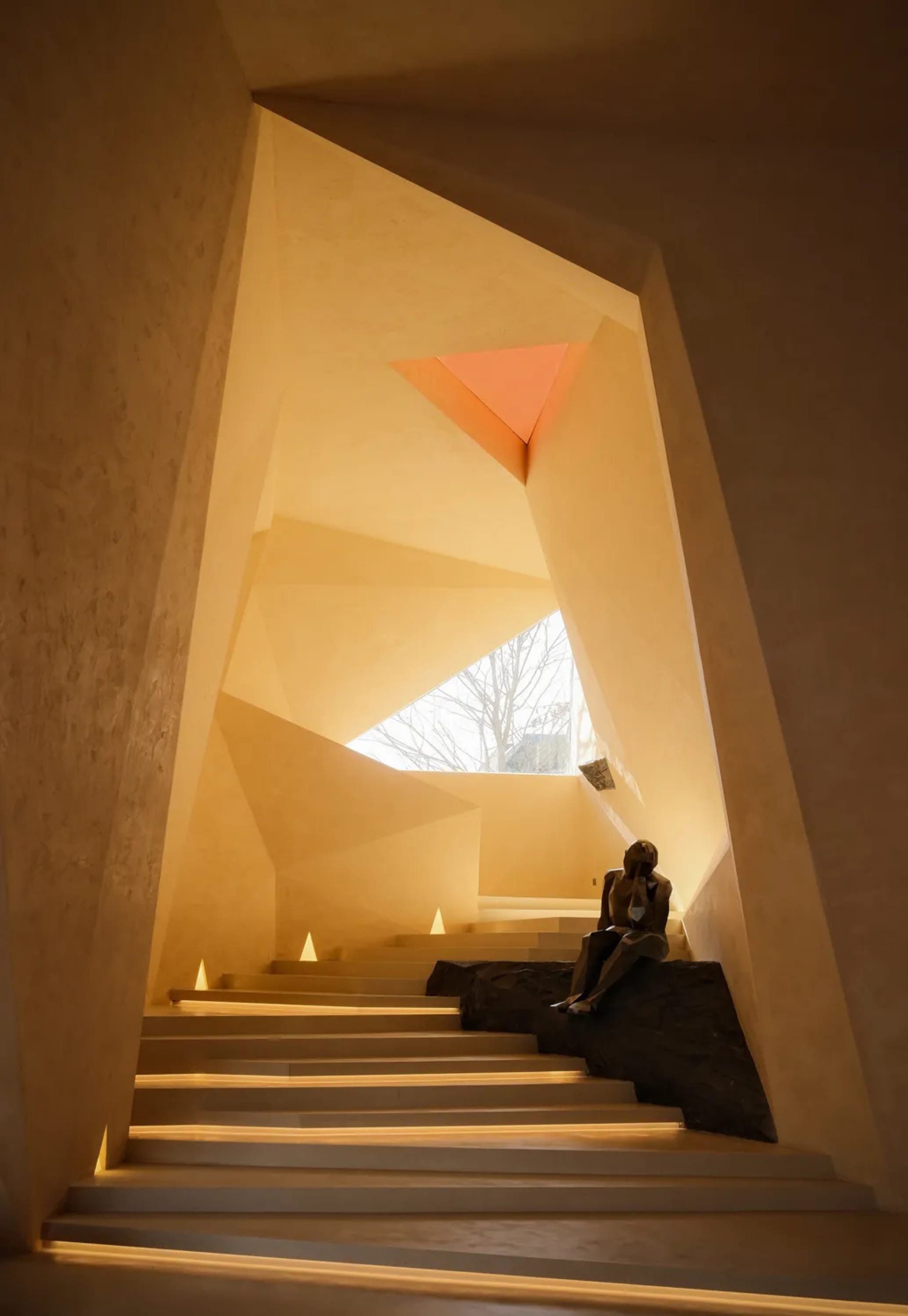 The image showcases a modern interior design featuring concrete elements.