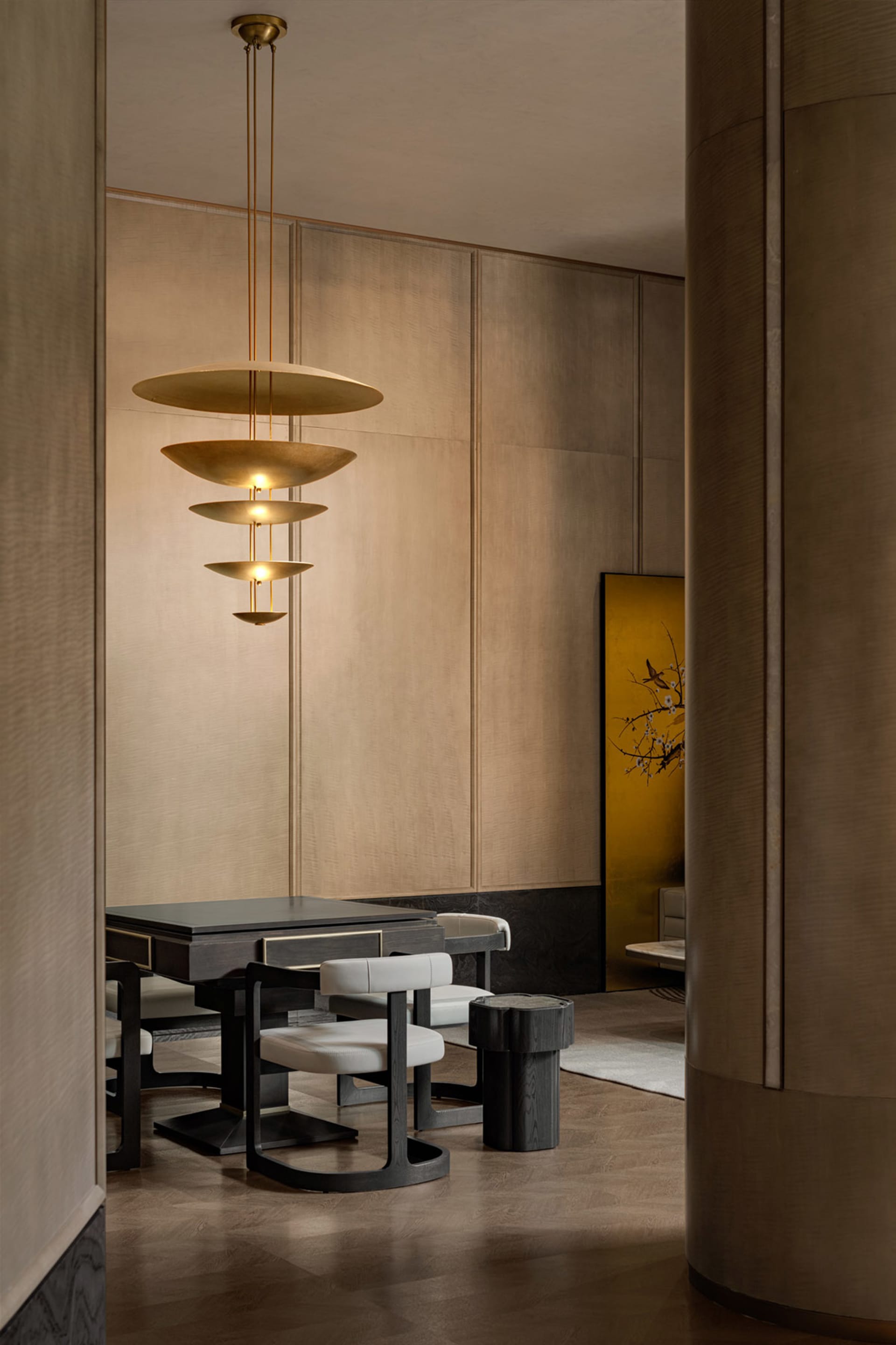 Modern dining room with wooden furniture and minimalist design.