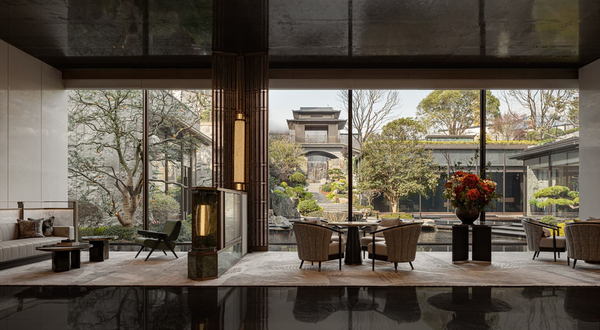 Modern lobby features glass and marble elements for sophisticated design.