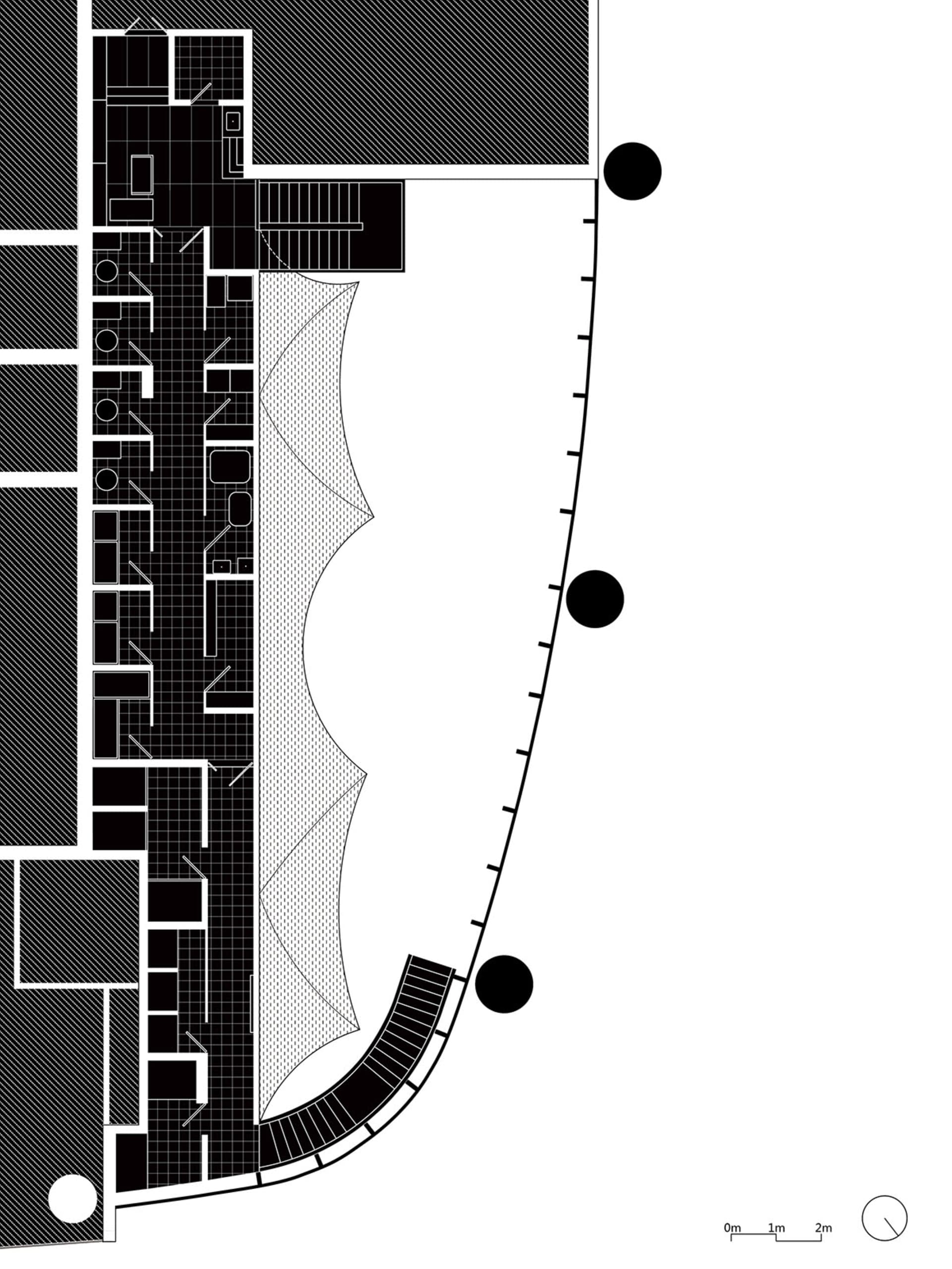 Floor plan of a modern office layout with mixed materials and geometric shapes.