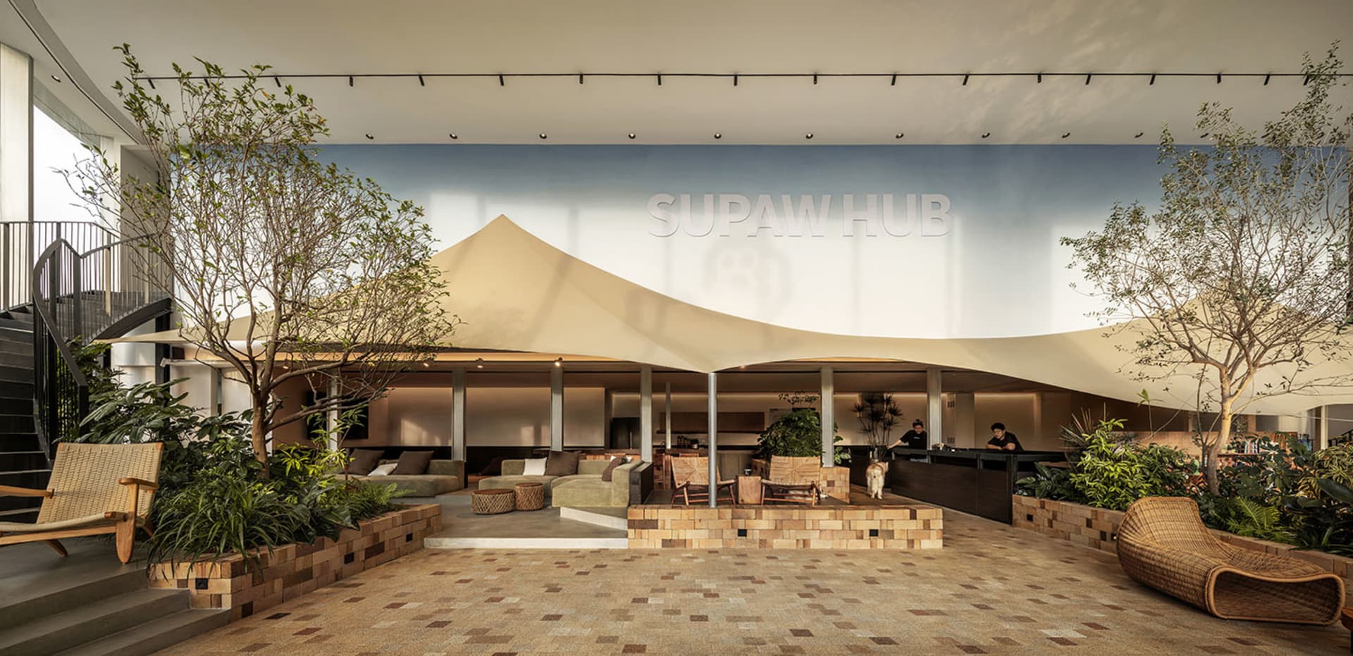 Industrial-style restaurant with brick walls and seating area