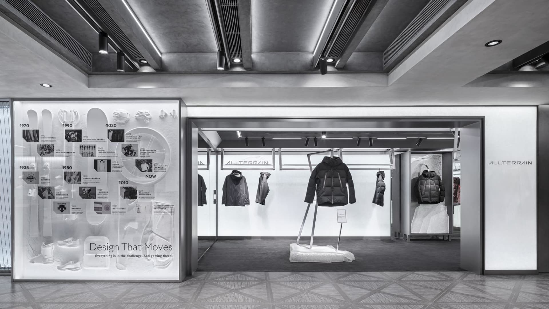 Retail storefront with modern concrete and glass design elements.