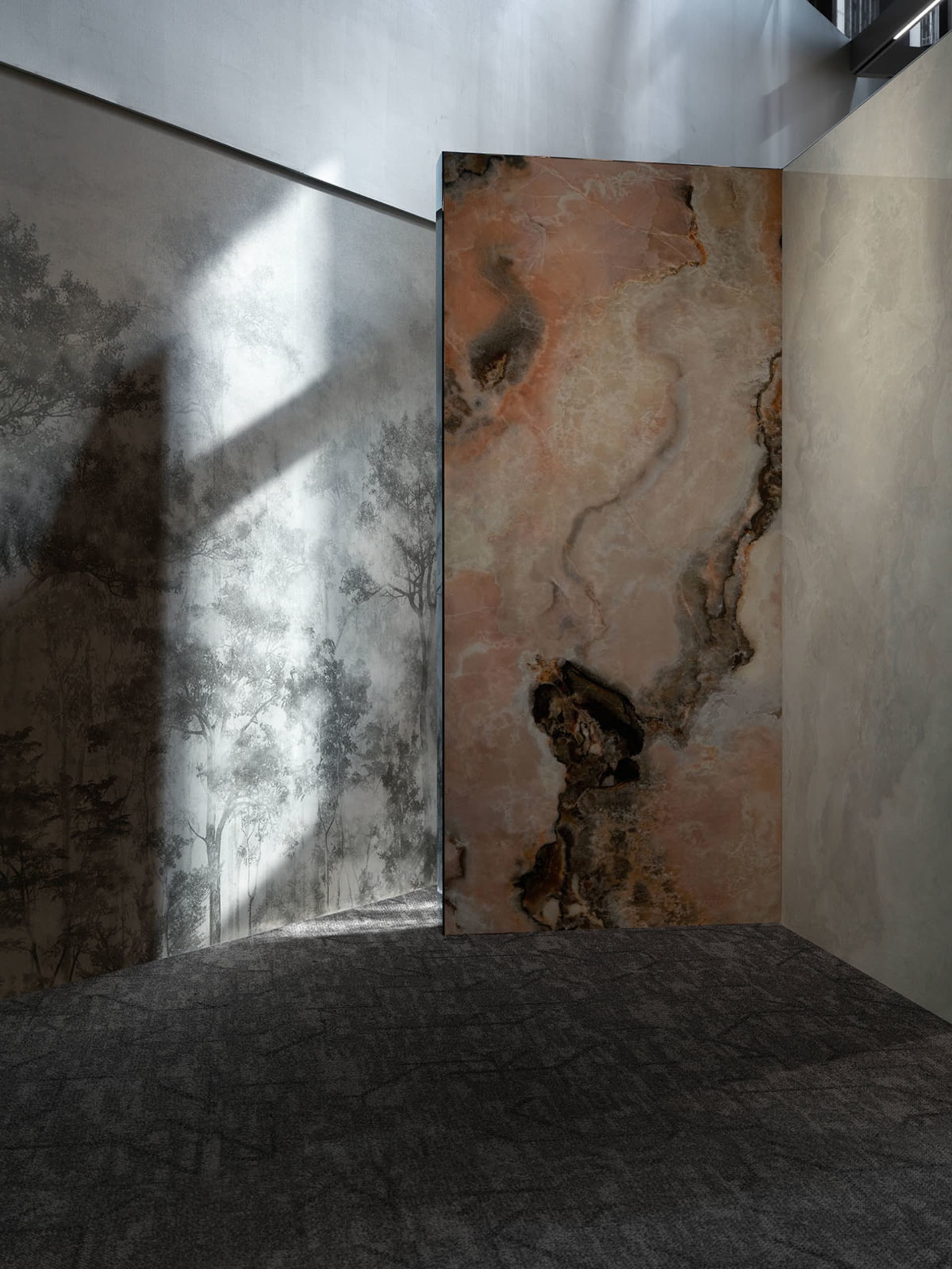 A modern interior design featuring marble panels with artistic patterns.