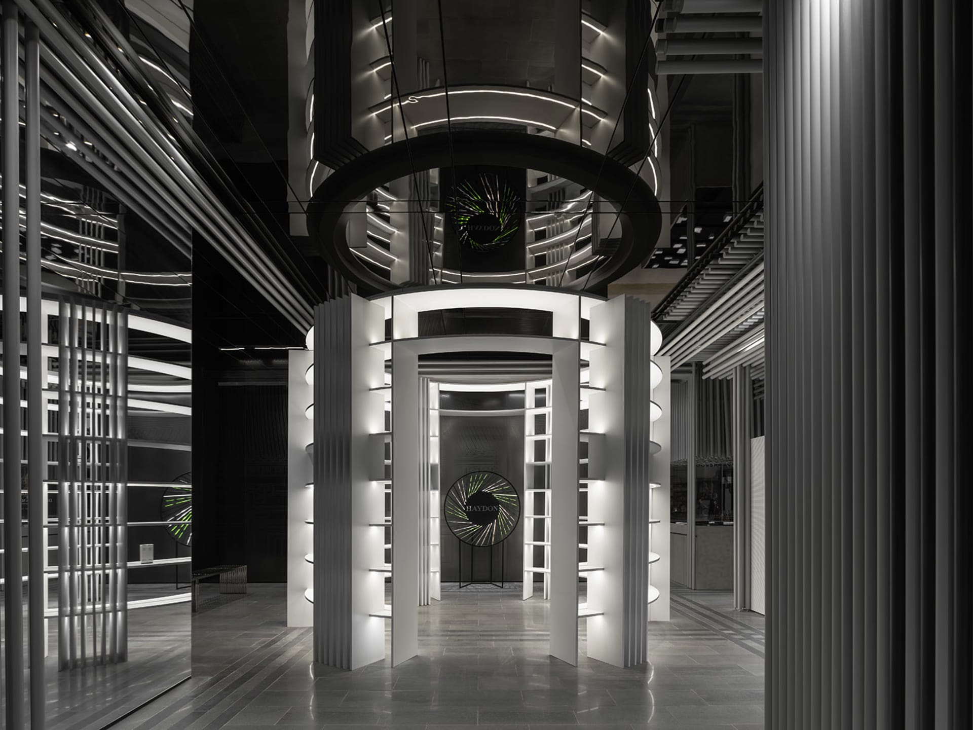 A modern commercial space featuring metal and glass elements.