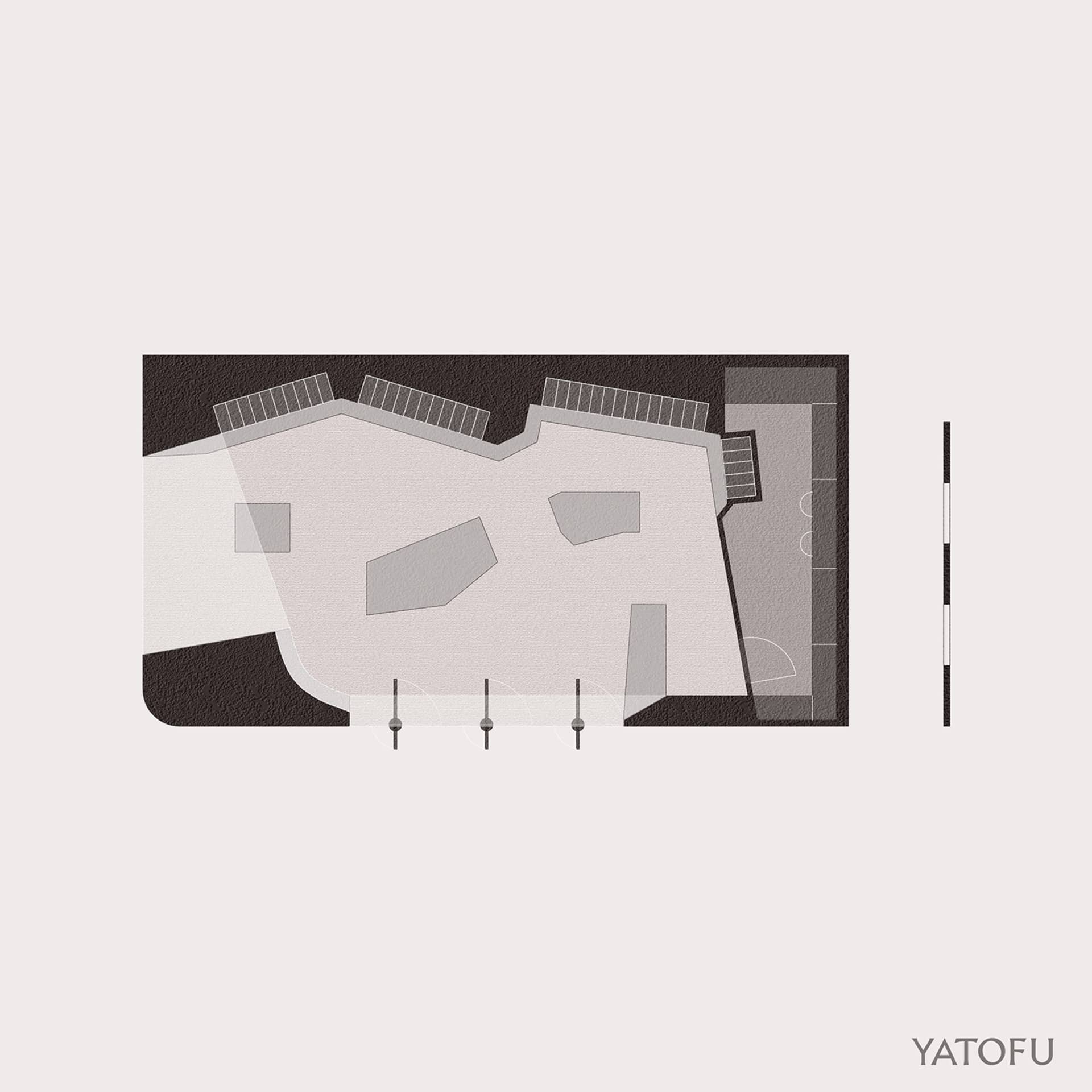 A modern office space featuring concrete walls and floors.