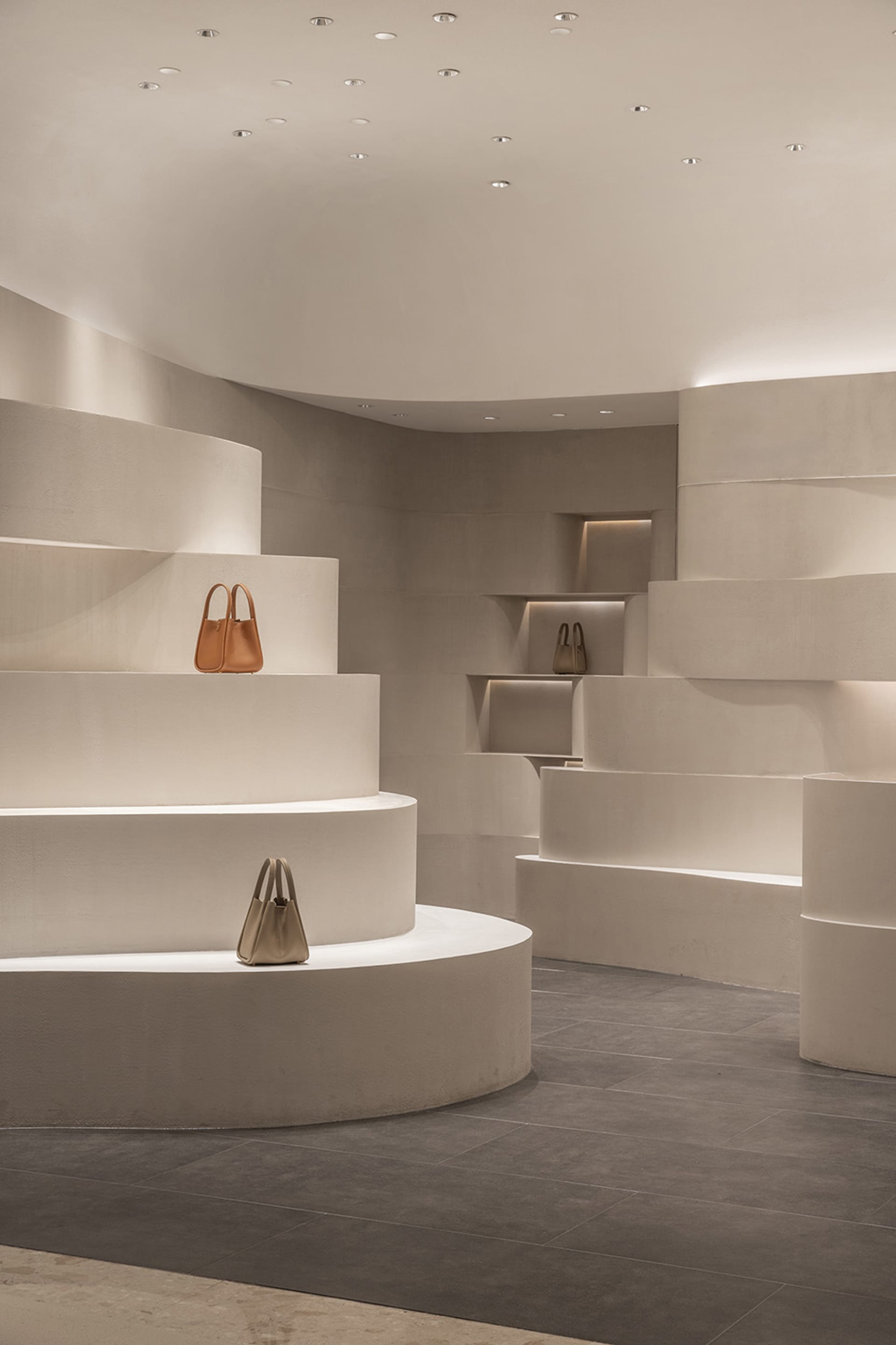 A minimalist space featuring concrete elements, designed for contemporary aesthetics.