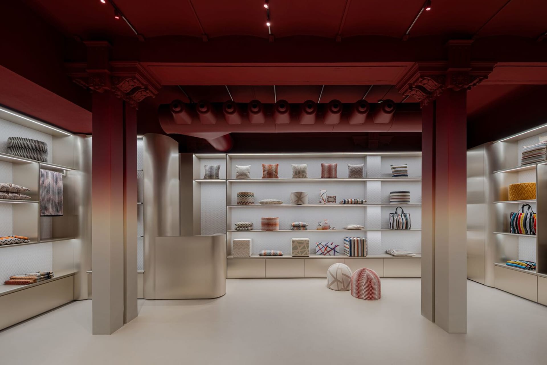 Interior design of a modern retail space featuring shelves with decorative objects.