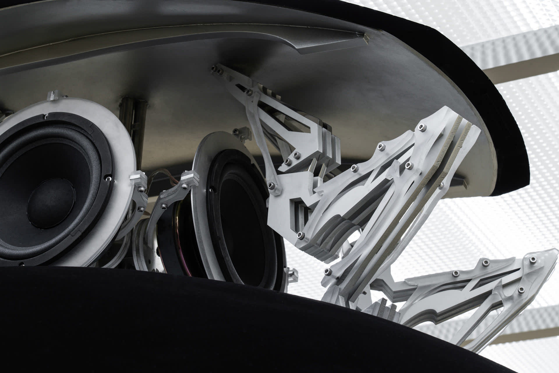 Detailed metal speakers integrated into a sound system design