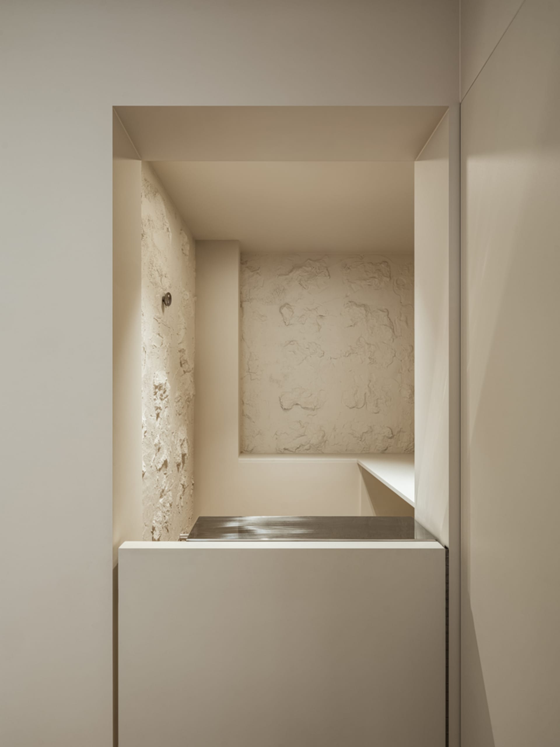 Minimalist bathroom with a concrete and metal interior