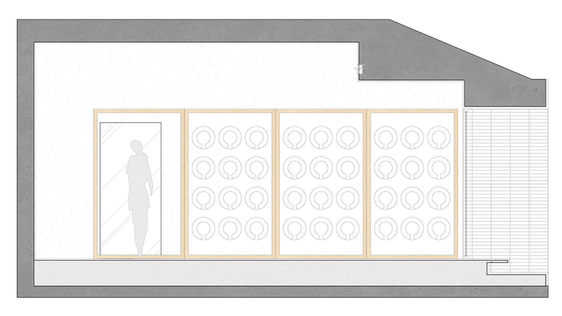 A technical design floor plan depicting a modern storefront with large glass windows.
