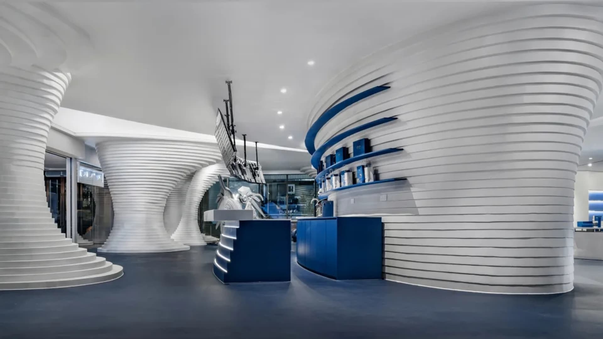 Modern storefront design with metal, glass, and concrete materials