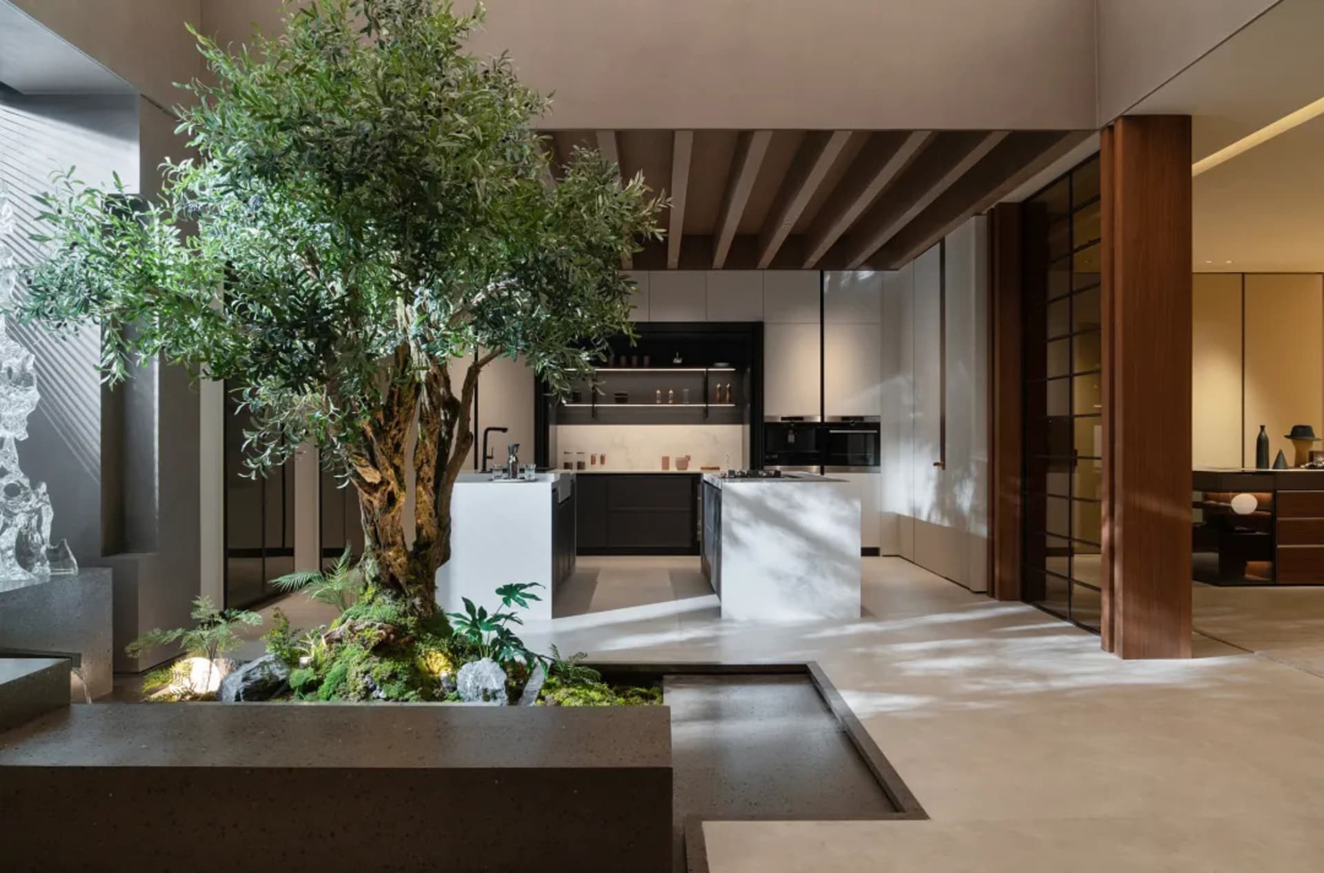 A modern kitchen featuring concrete materials and industrial design elements.