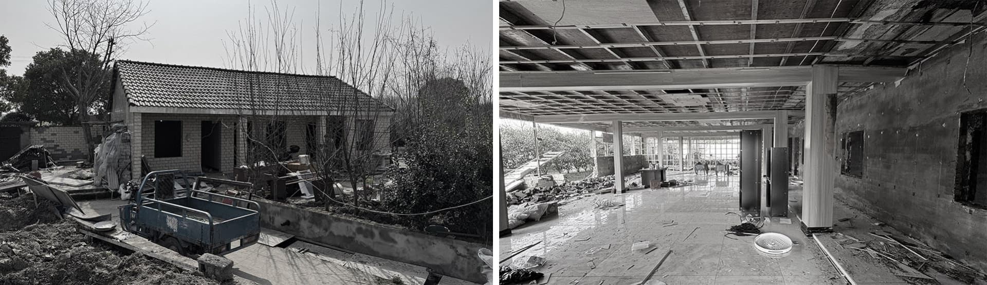 An empty, abandoned concrete space with broken glass and debris on the floor.