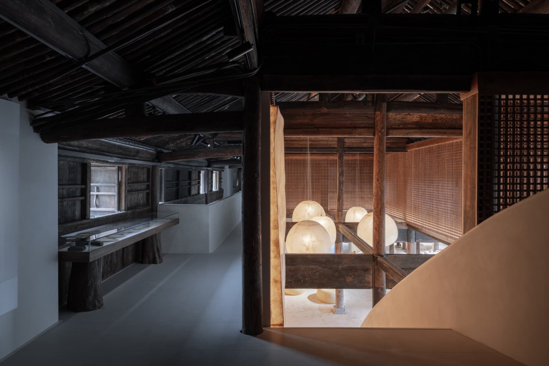 Modern art gallery featuring wooden interior design elements.