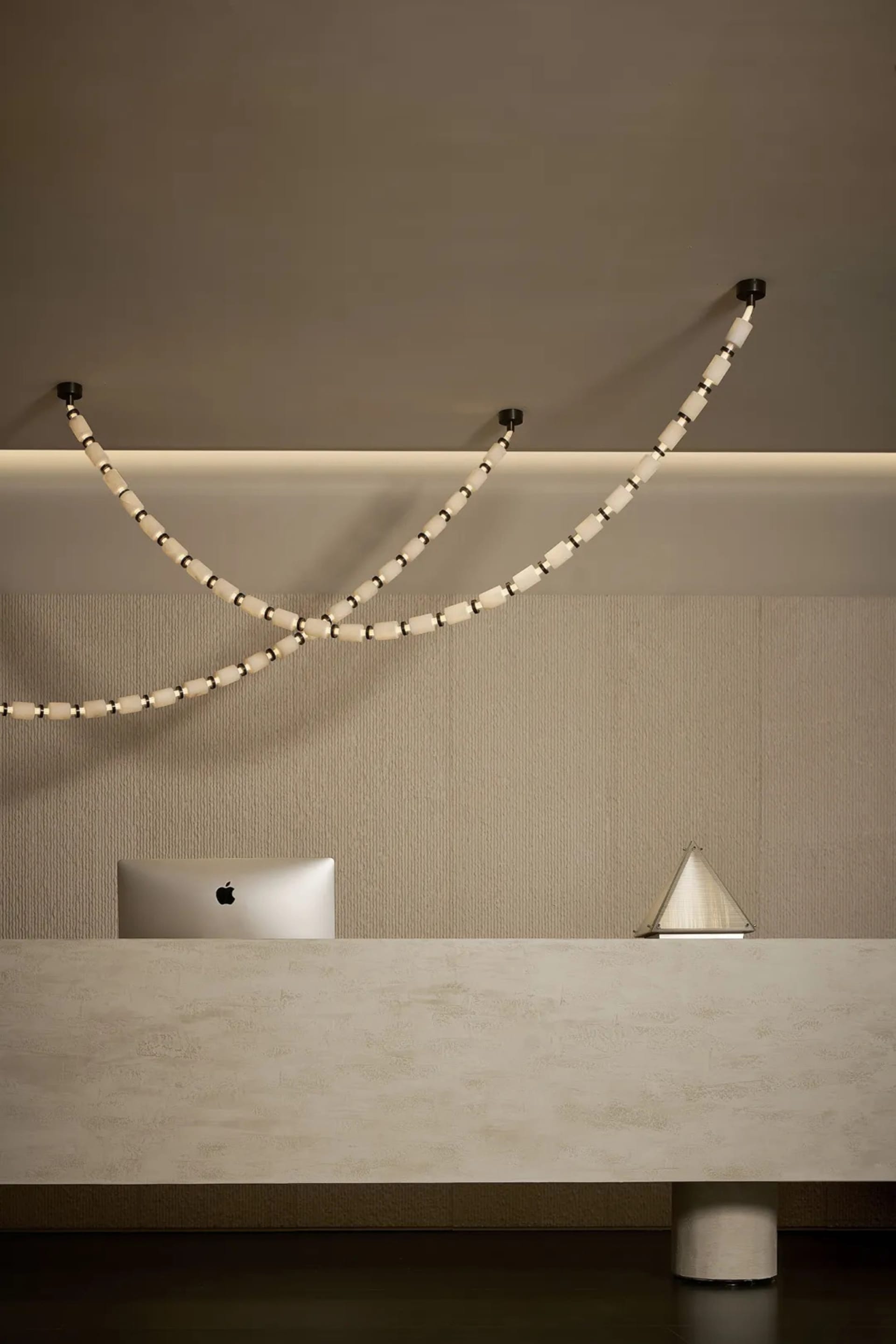 Modern, minimalist industrial-style reception desk made of metal