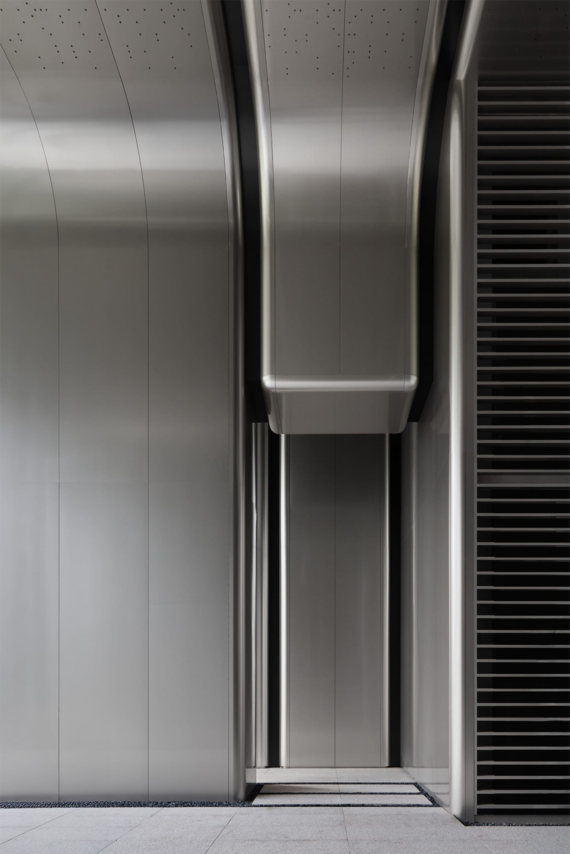 Modern design featuring metallic panels in an interior space